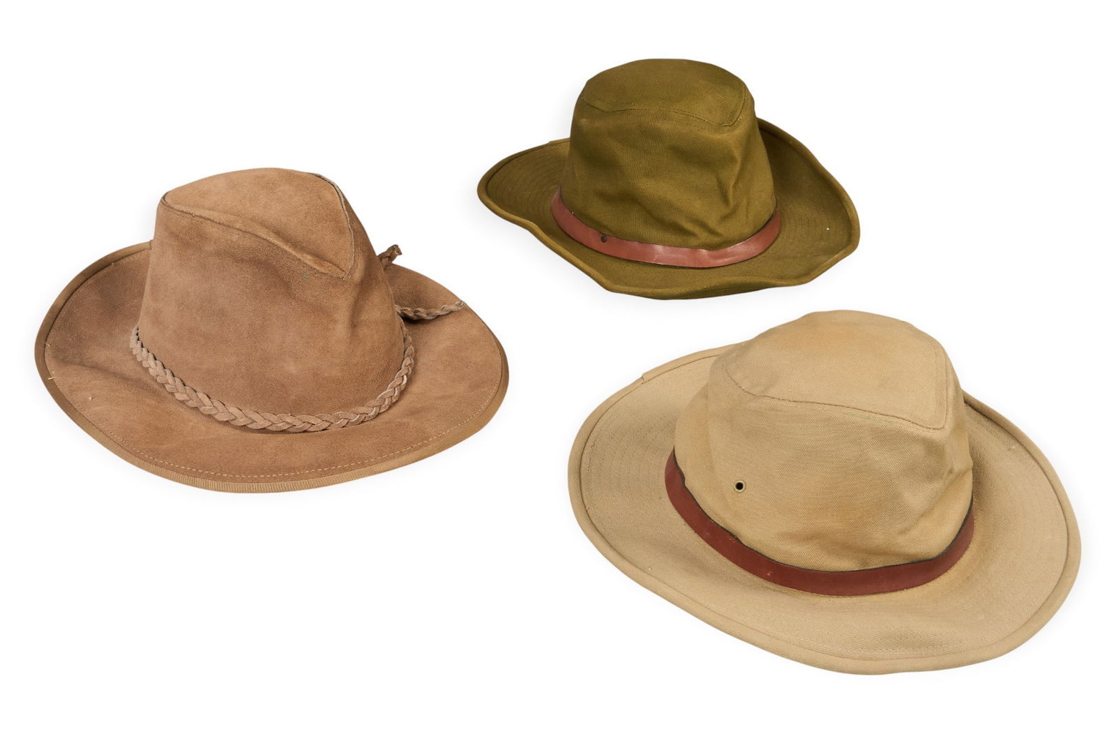 T. R. Fehrenbach | (3) Hats: Collection of three hats, includes a tan suede hat with braided band, an olive green hat with ribbon, and a tan safari-style hat with leather band, with Certificate of Authenticity height 5.5