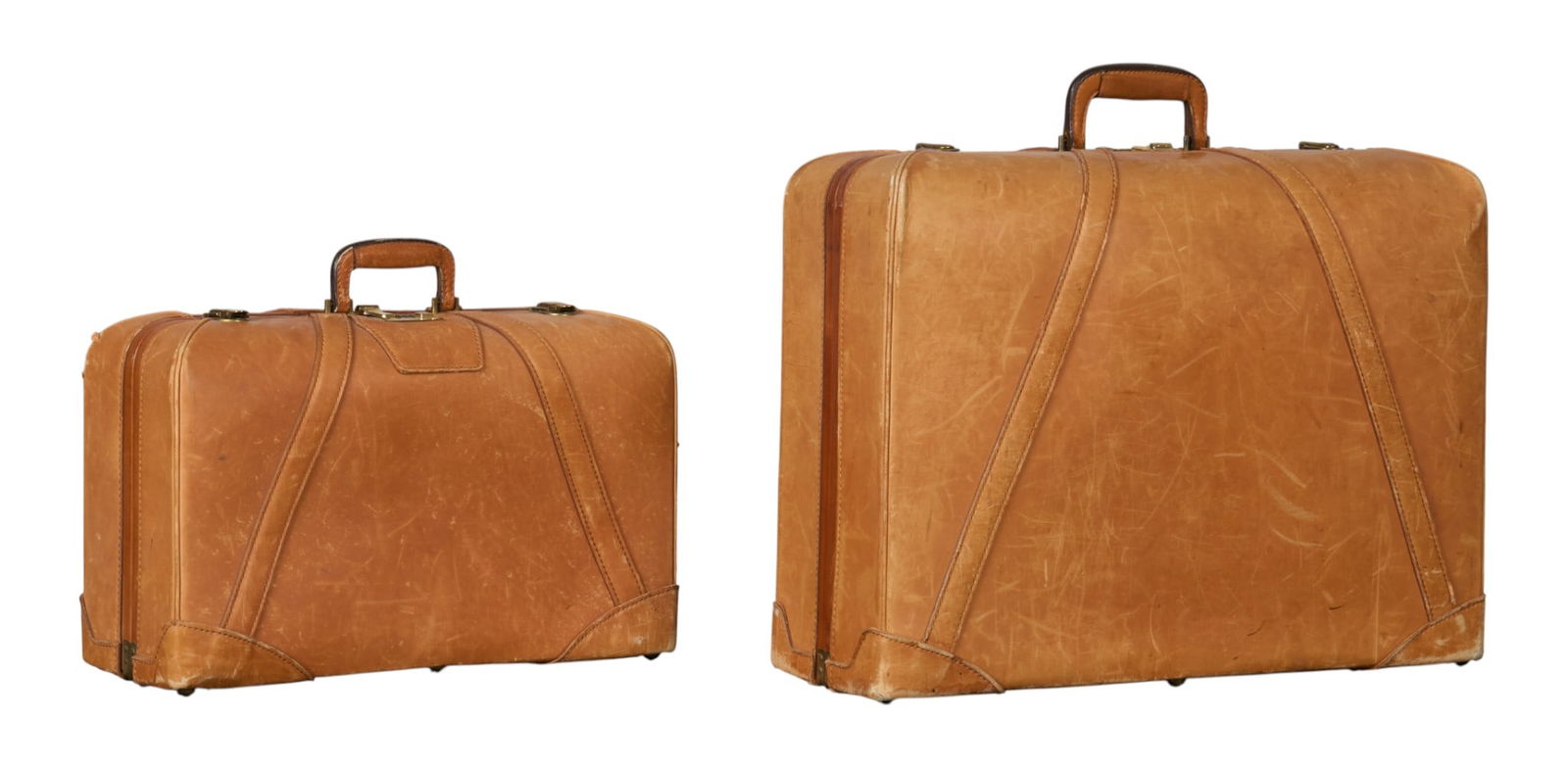 T. R. Fehrenbach | (2) Vintage Stylite Leather Suitcases: Set of two vintage Stylite leather suitcases, monogrammed, with combination locksheight 19.5 in. x width 26 in. x depth 8.5 in. / largestProvenance: The personal estate of noted Texas historian and