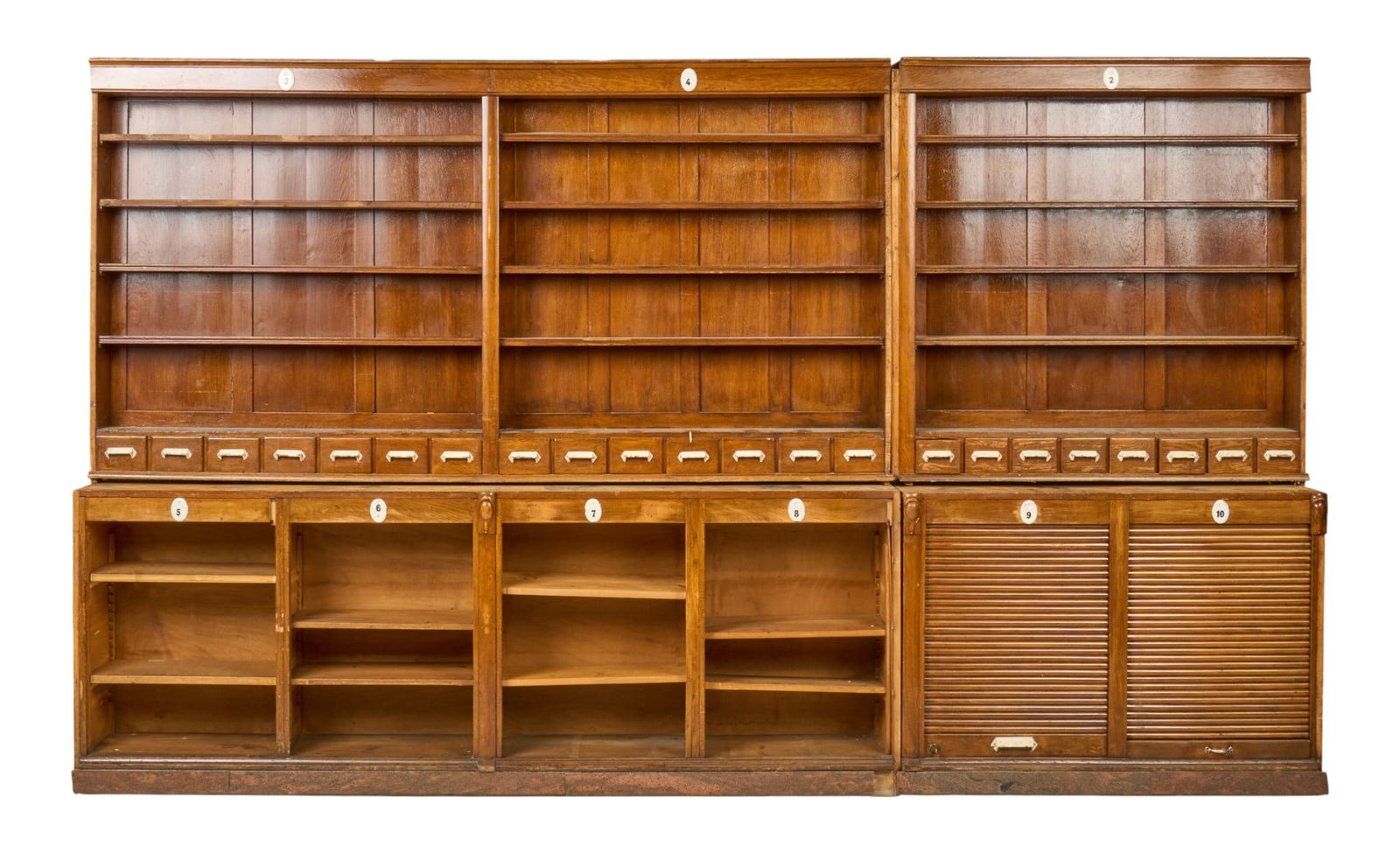 Monumental Apothecary Cabinet: Monumental twelve-foot-wide apothecary cabinet, made of four sections, with two shelved top sections with numerous drawers, supported on two base sections with open shelving and tambour cabinet height