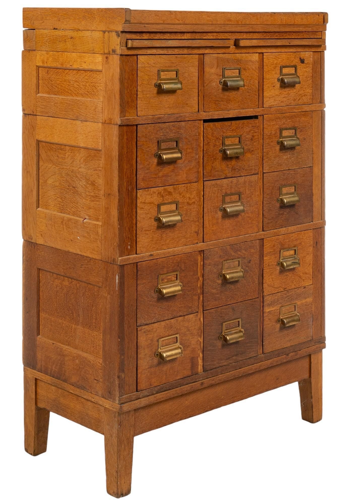 Stacking File Cabinet: Stacking wooden file cabinet, featuring fifteen pull drawers in five rows with metal hardware, cabinet stacks in three parts, supported on tapered block legs.height 53 in. x width 33 in. x depth 18