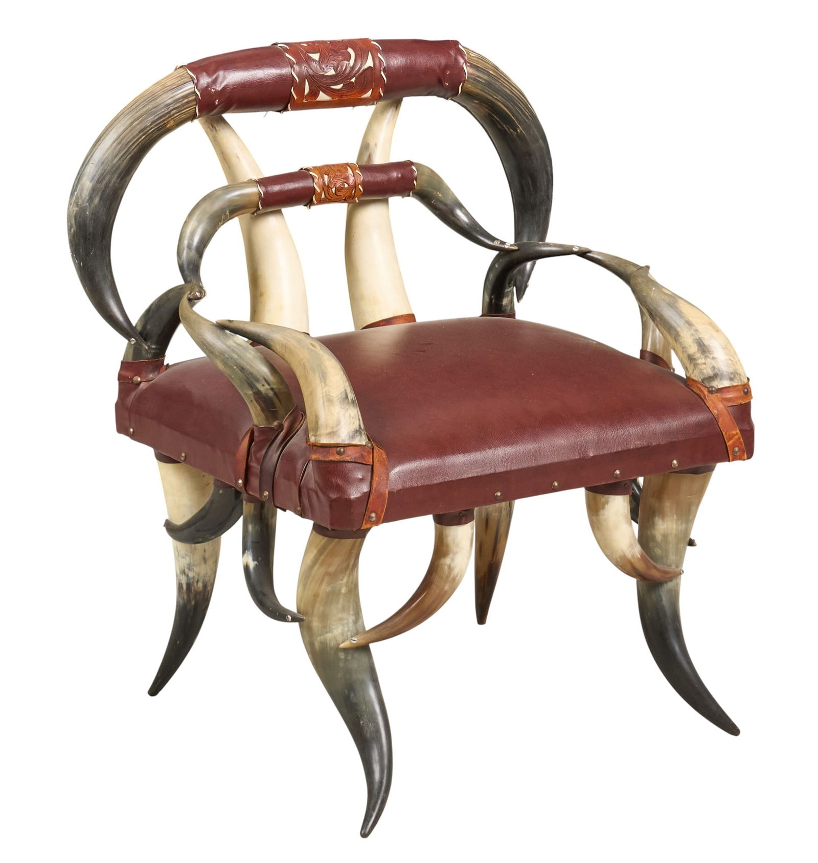 After Friedrich August Wenzel Horn Chair: After Friedrich August Wenzel armchair with steer horn frame, and cushioned leather seatheight 35.5 in. x width 30 in. x depth 24 in. Provenance: Property from a home in Goldwaithe,