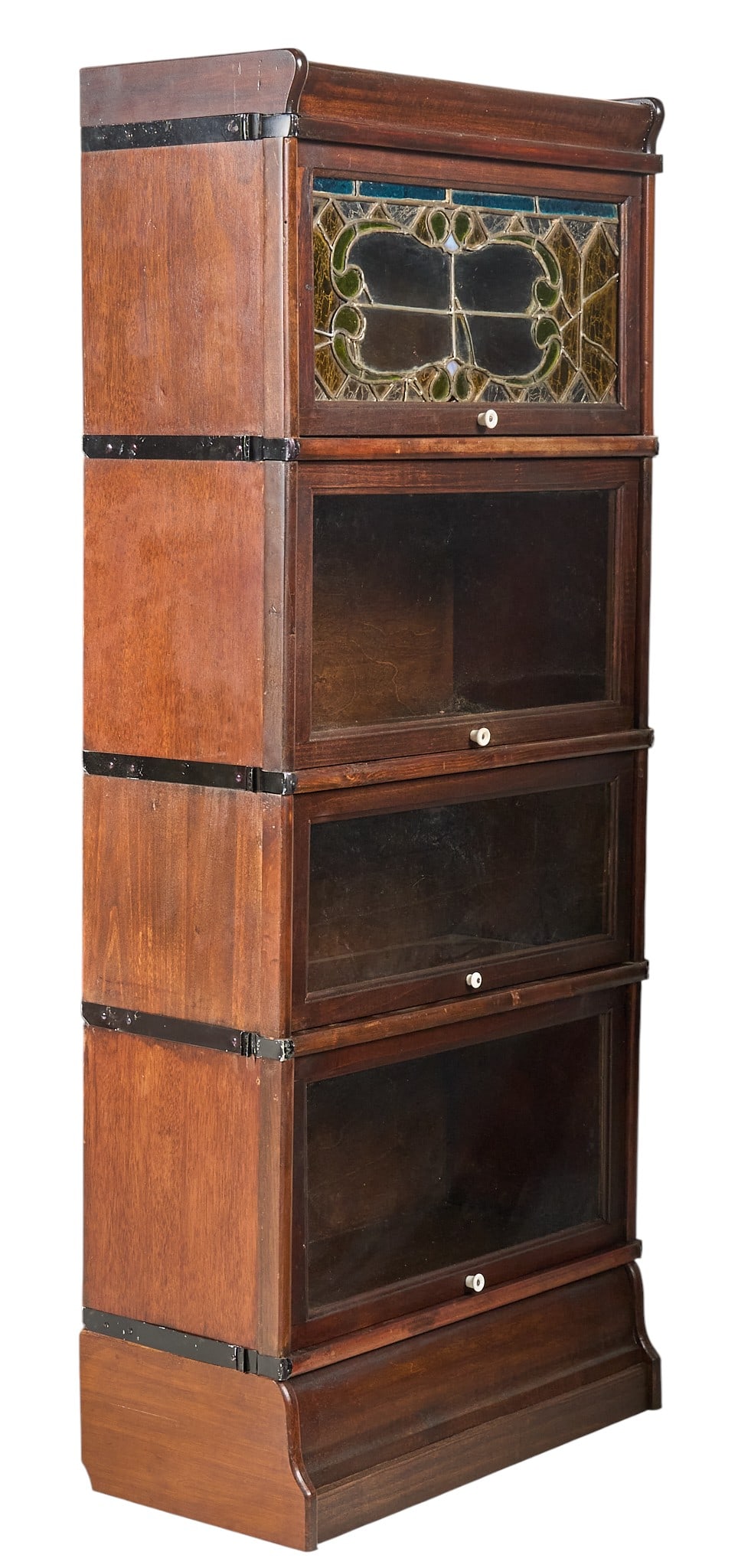Vintage Stacking Bookcase: Vintage stacking bookcase with four tiers of storage, with leaded glass decoration in top tier module height 60 in. x width 25.5 in. x width 11 in. Provenance: Property from a home in San A