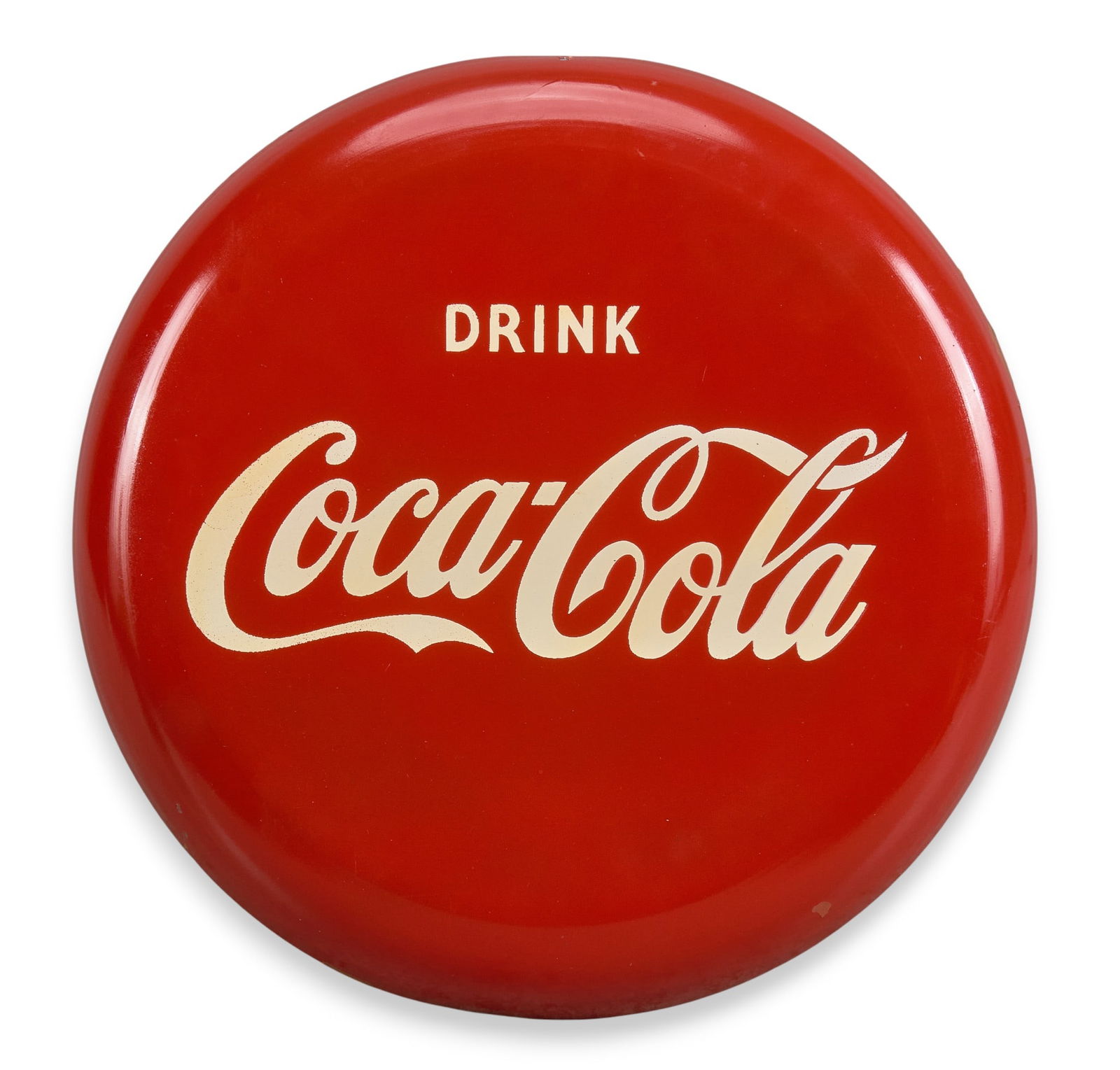 Coca-Cola Button Sign, 21st C.: Coca-Cola button sign, painted metal reproduction, circa 21st centurydiameter 12 in. x depth 1 in. Provenance: Property from a New Braunfels, Texas collector of vintage signage