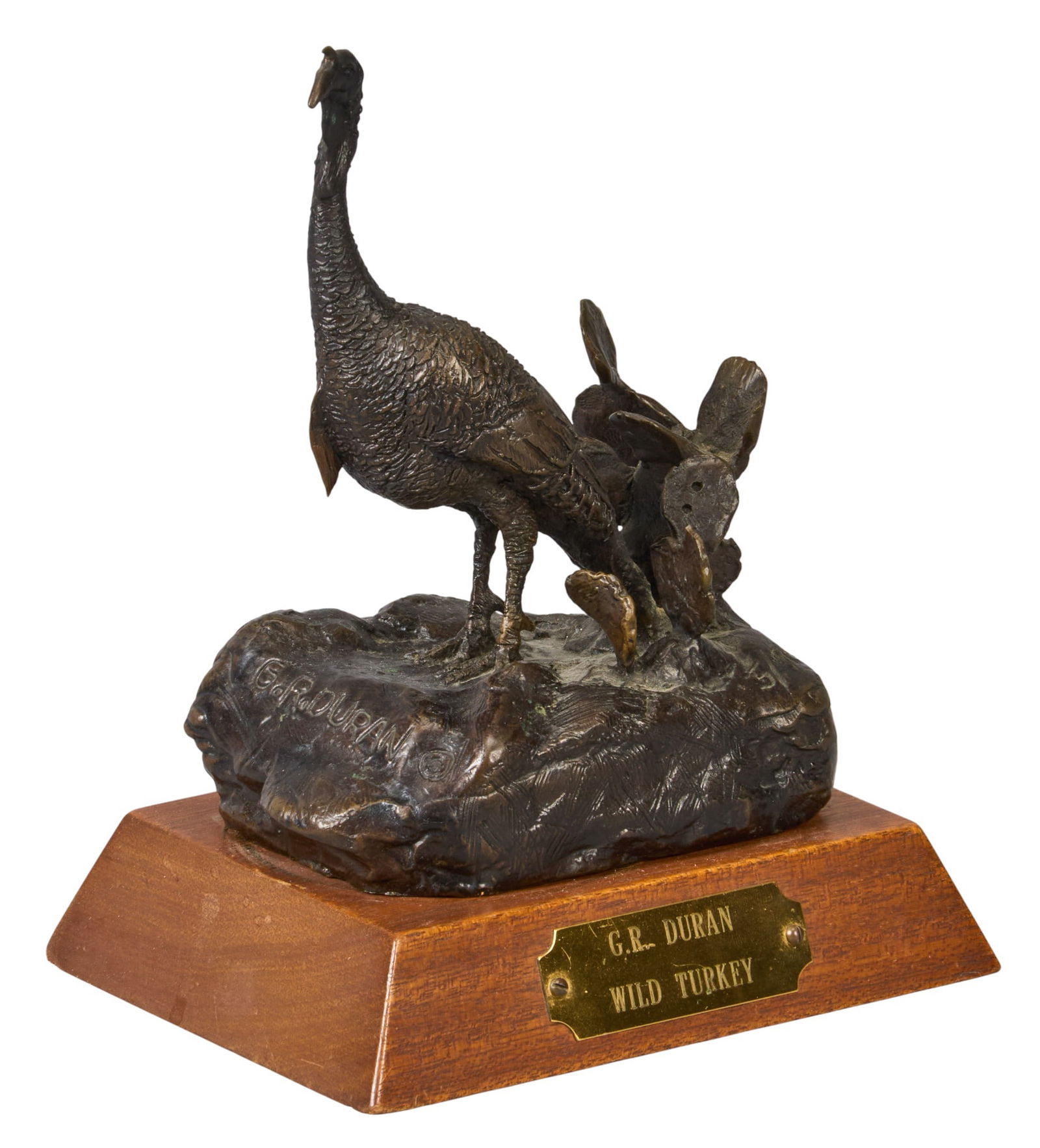 Gilbert Duran, "Wild Turkey" Bronze: Gilbert Duran (Texas, 1947-2023), "Wild Turkey", artist-cast bronze sculpture on wooden base, ed. 5/76, stamped with signatureheight 8 in. x width 6 in. x depth 4.75 in.Provenance: Property