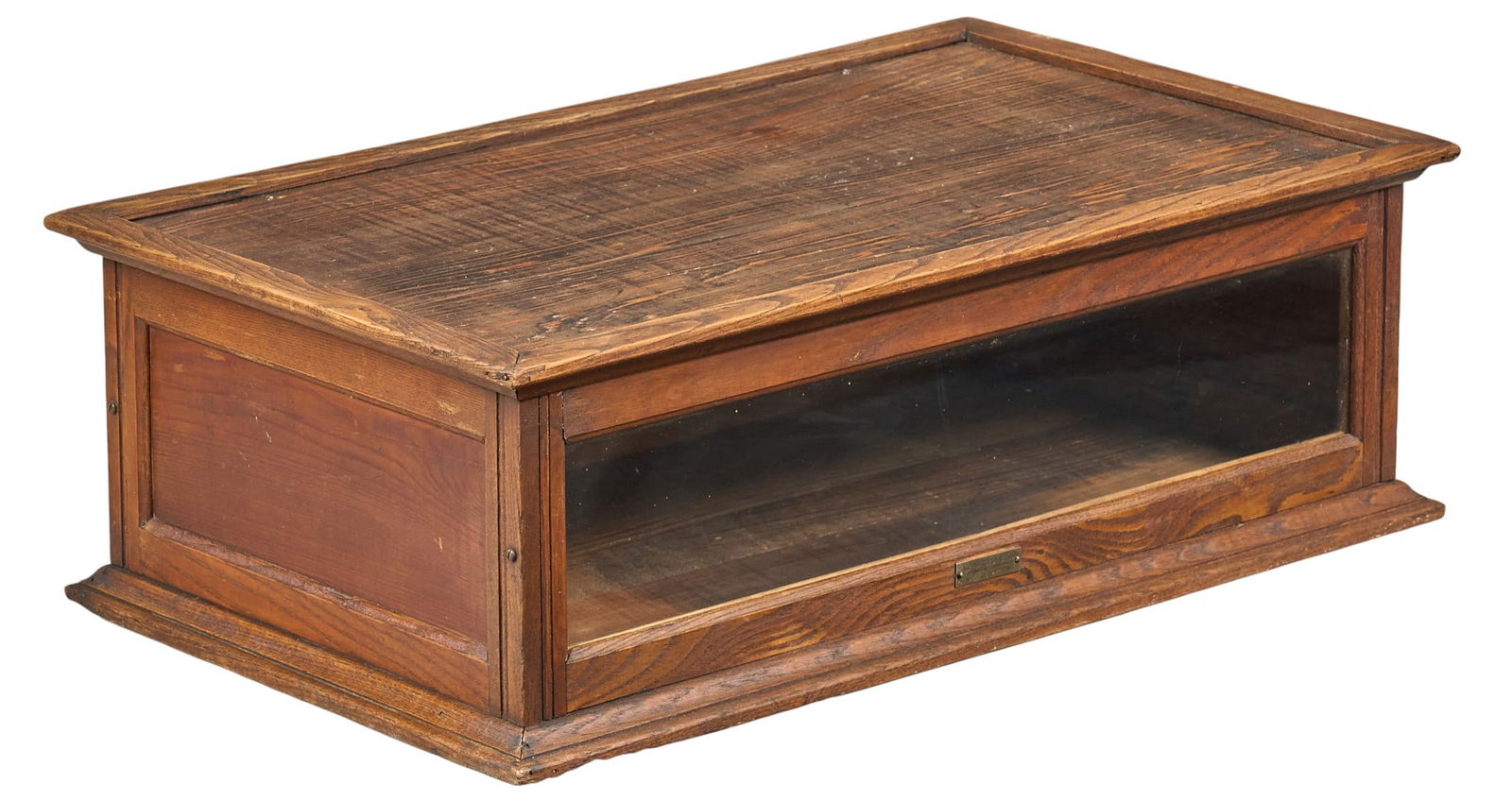 Vintage Schwanbeck Bros. Showcase: Vintage Schwanbeck Bros. rustic wooden showcase, marked with metal plaqueheight 8.5 in. x width 26 in. x depth 15.5 in. Provenance: Property from a home in San Antonio, Texas