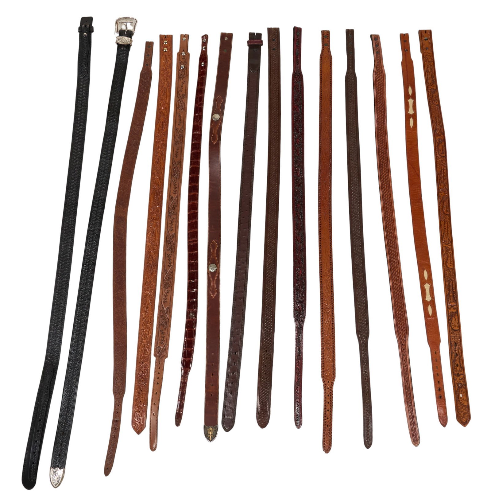 Collection of (14) Western Leather Belts: Collection of fourteen Western leather belts in varying lengths, in shades of brown and black, with belts featuring decorative tooling and buckles length 51 in. x width 3.5 in. / longest&nbs
