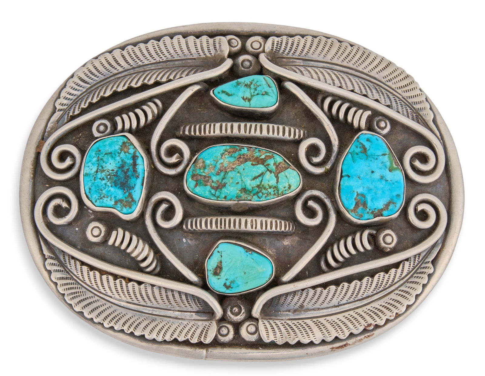 Substantial Sterling & Turquoise Buckle: Substantial sterling silver buckle with inlaid turquoise stones and feather motifs, marked "JVB" Size: 4 in. x 5.25 in.Total weight: 7.285 ozt