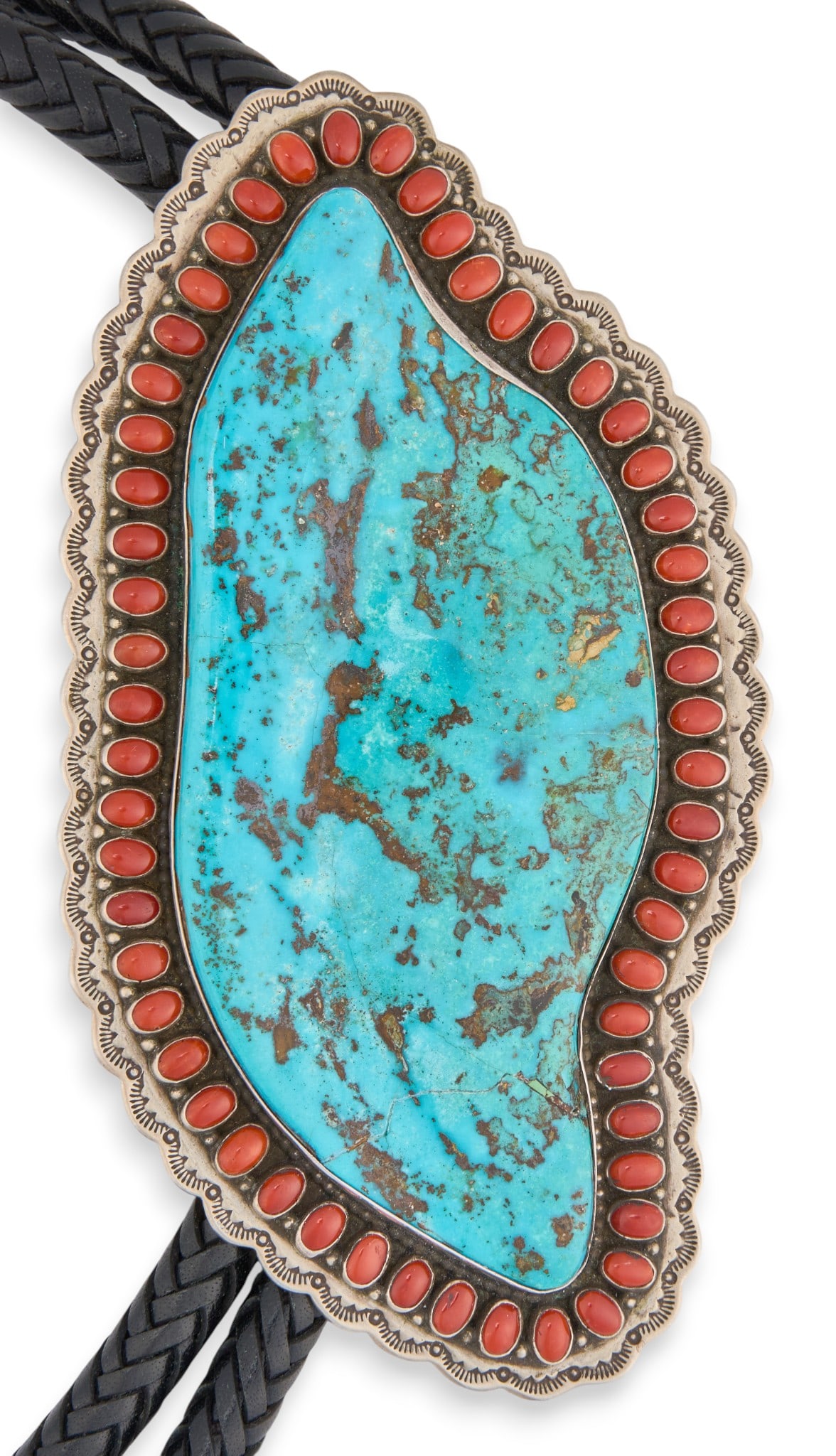 Matthew Charley, Sterling Silver Coral & Turquoise Bolo Tie: Matthew Charley, substantial Navajo sterling silver bolo tie with pendant featuring large inlaid turquoise stone, flanked by inlaid coral cabochons, on this braided black leather cord, signed "Ma