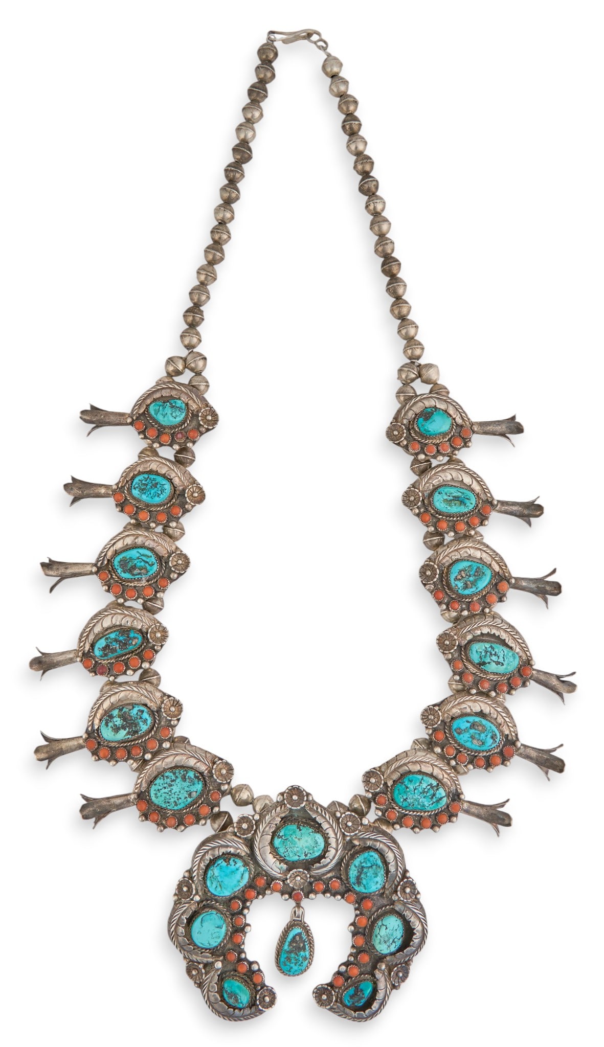 Vintage Turquoise & Coral Squash Blossom Necklace: Vintage sterling silver squash blossom necklace, with inlaid turquoise and coral throughout, featuring floral and feather motifs, with hook and eye closure, stamped "BT" Length: 29 in.T