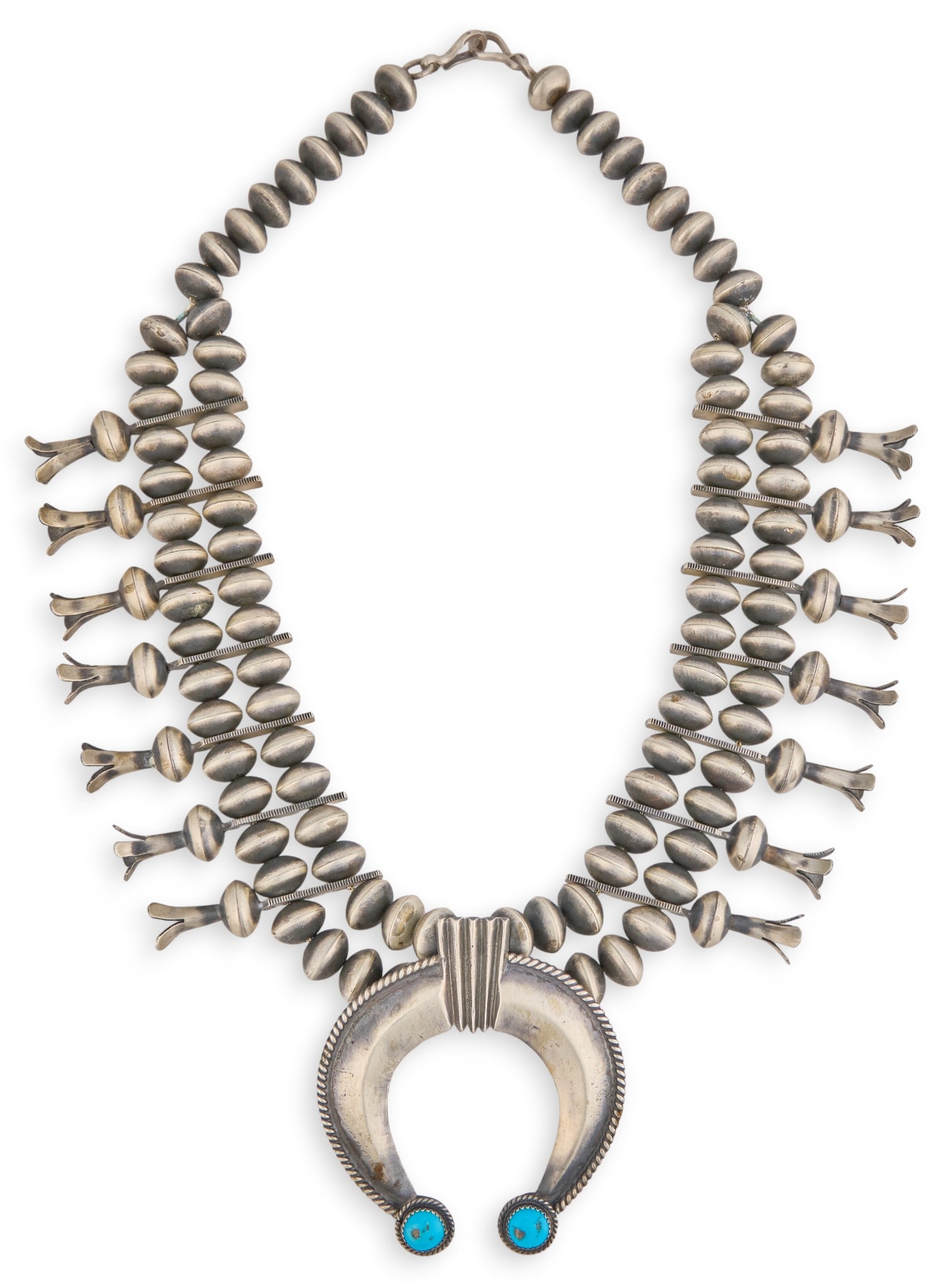 Contemporary Squash Blossom Necklace: Contemporary sterling silver squash blossom necklace, with inlaid turquoise cabochons to naja, and twisted rope details, signed "G.P" (Greg Pat), and marked "Sterling" Length: 21.5