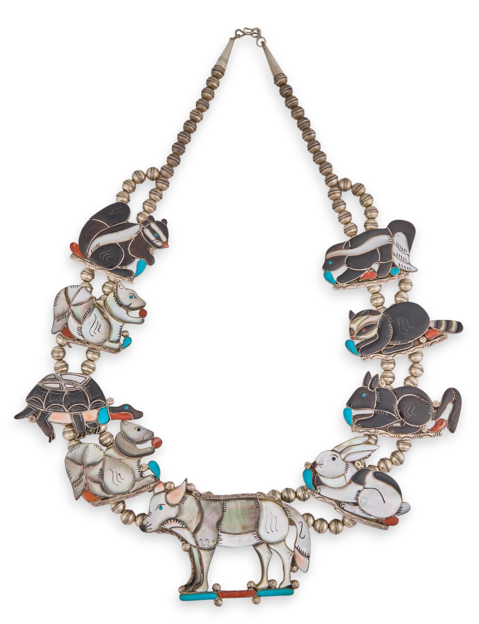 Zuni Inlaid Fetish Necklace: Zuni sterling silver fetish necklace, with inlaid animal motifs featuring turquoise, coral, and mother of pearl details, with hook and eye closure, marked "Sterling" Length: 25 in.Total