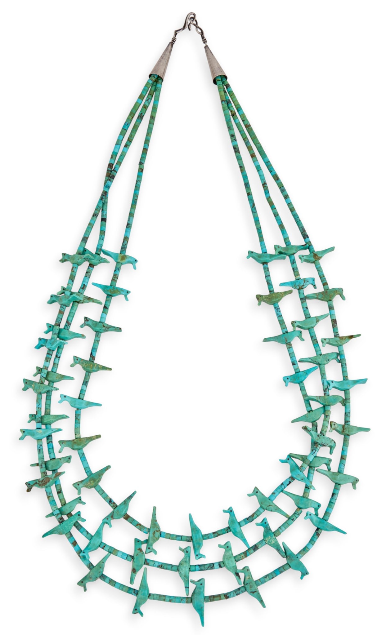 Zuni Beaded Turquoise Fetish Necklace: Zuni multi-stranded turquoise fetish necklace, featuring three strands of turquoise beads depicting animal motifs, with hook and eye closure Length: 25.5 in. Provenance: Property from a home in San An