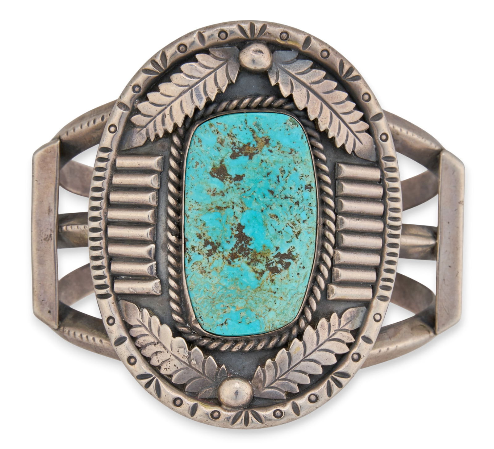 Substantial Turquoise Cuff: Substantial sterling silver cuff bracelet, with central inlaid turquoise stone, featuring feather and twisted rope motifs Circumference: 7.5 in.Total weight: 4.945 ozt Provenance: Property from a home