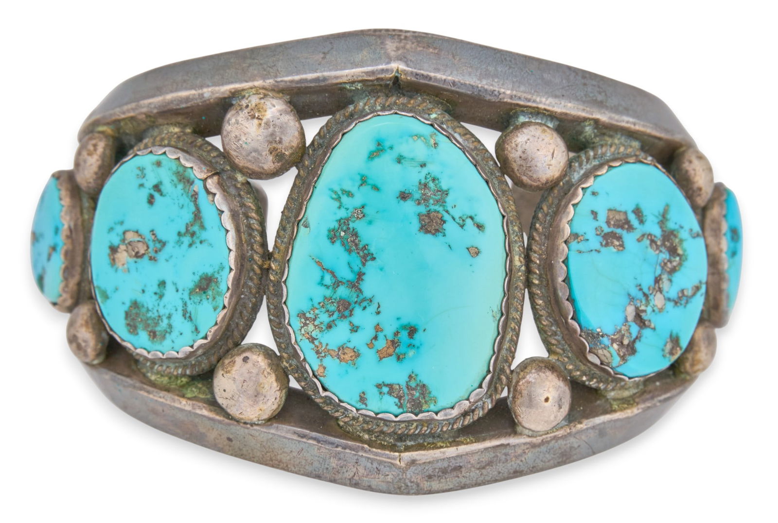 Sterling & Turquoise Cuff: Sterling silver cuff bracelet, with five inlaid turquoise stones, with pierced and twisted rope details, signed "David Kuster" Circumference: 7.5 in.Total weight: 5.545 ozt
