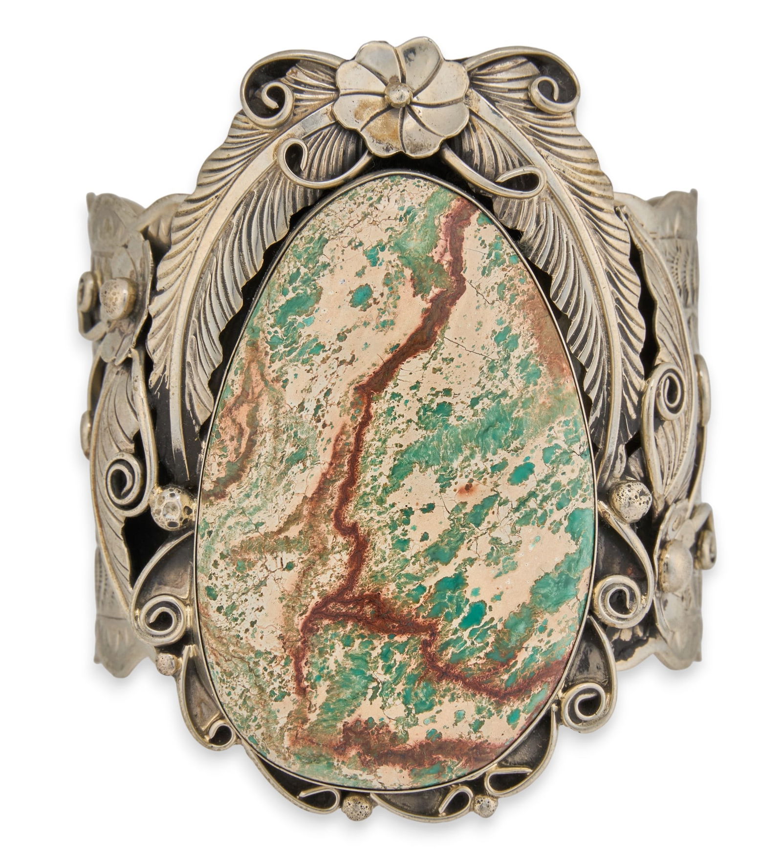 Sterling Silver & Jasper Cuff: Sterling silver cuff bracelet, with large inlaid jasper stone, featuring floral and feather motifs, signed "Percy Spencer"Circumference: 7.25 in. Total weight: 4.37 oztProvenance: Property