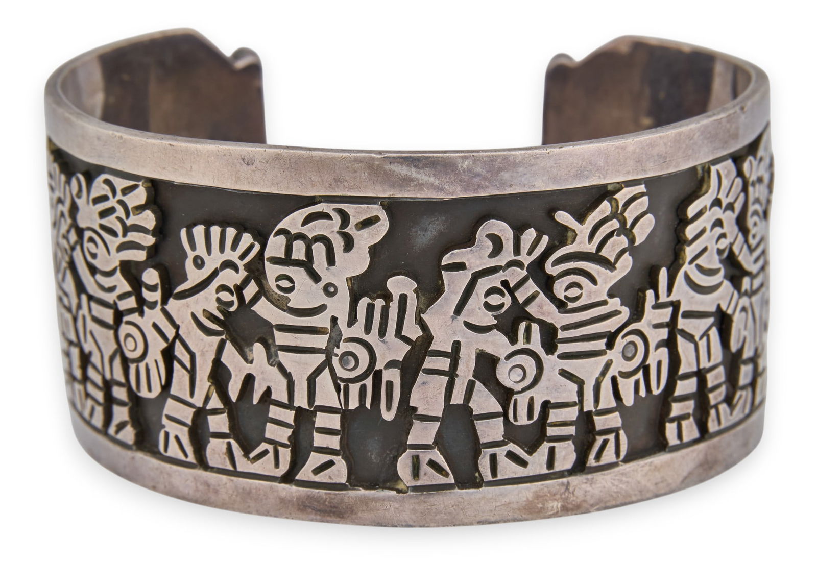 Mexican Sterling Silver Cuff Bracelet: Mexican sterling silver cuff bracelet, with figural scene to exterior, marked "Sterling 925" and "Hecho en Mexico" Circumference: 7.5 in.Total weight: 3.185 ozt Provenance: Propert