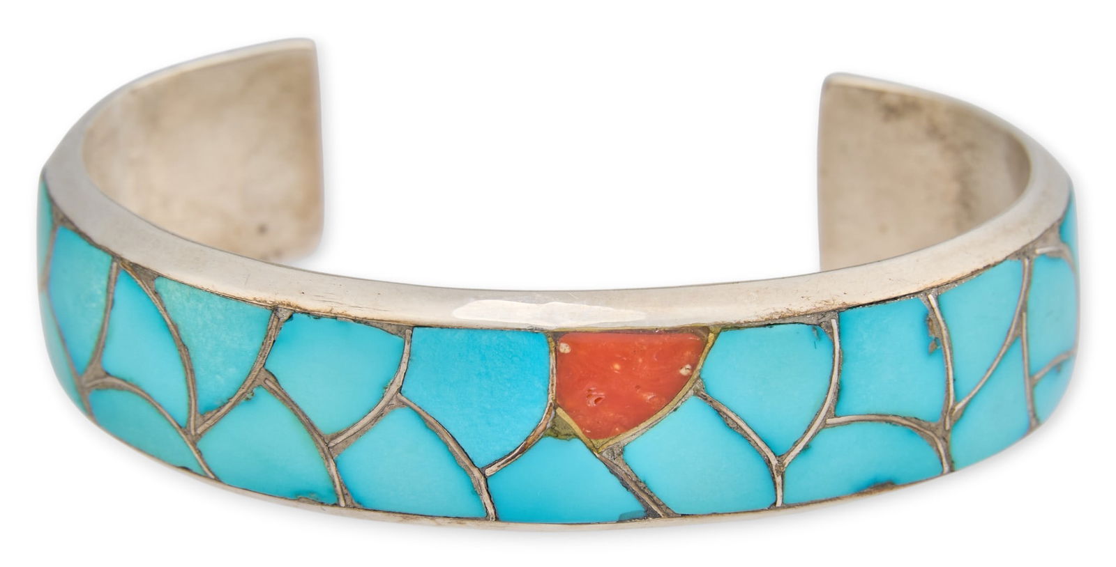 Signed "STM" Inlay Turquoise/Coral Cuff: Sterling silver cuff bracelet, with inlaid turquoise and coral details, marked "STM"Circumference: 6.5 in. Total weight: 0.855 oztProvenance: Property from the collection of a San