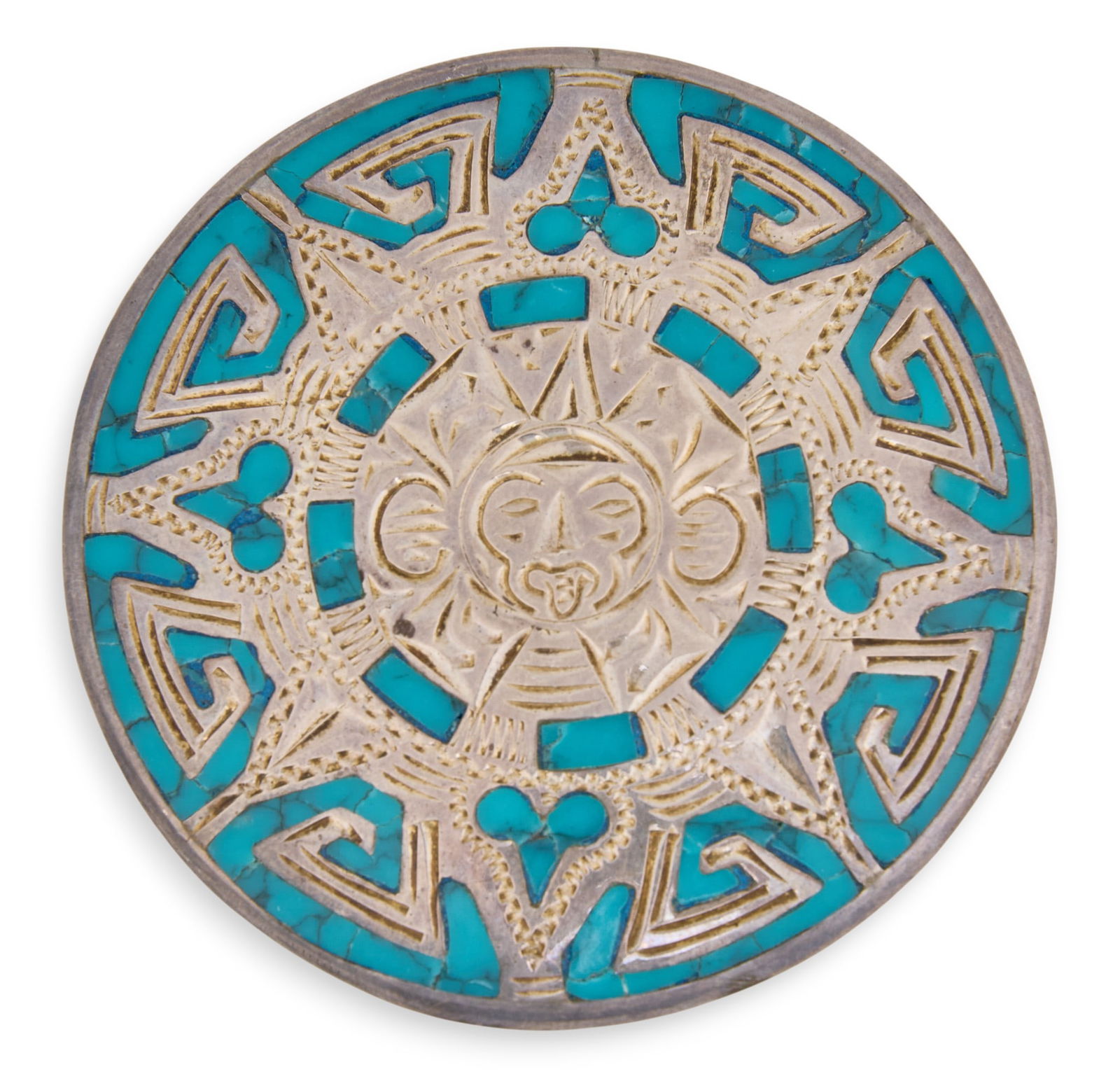 Mexican Sterling & Turquoise Brooch: Mexican sterling silver circular brooch with turquoise chip inlay, marked "Mexico Sterling"Total weight: 0.68 oztProvenance: Property from a home in San Antonio, Texas