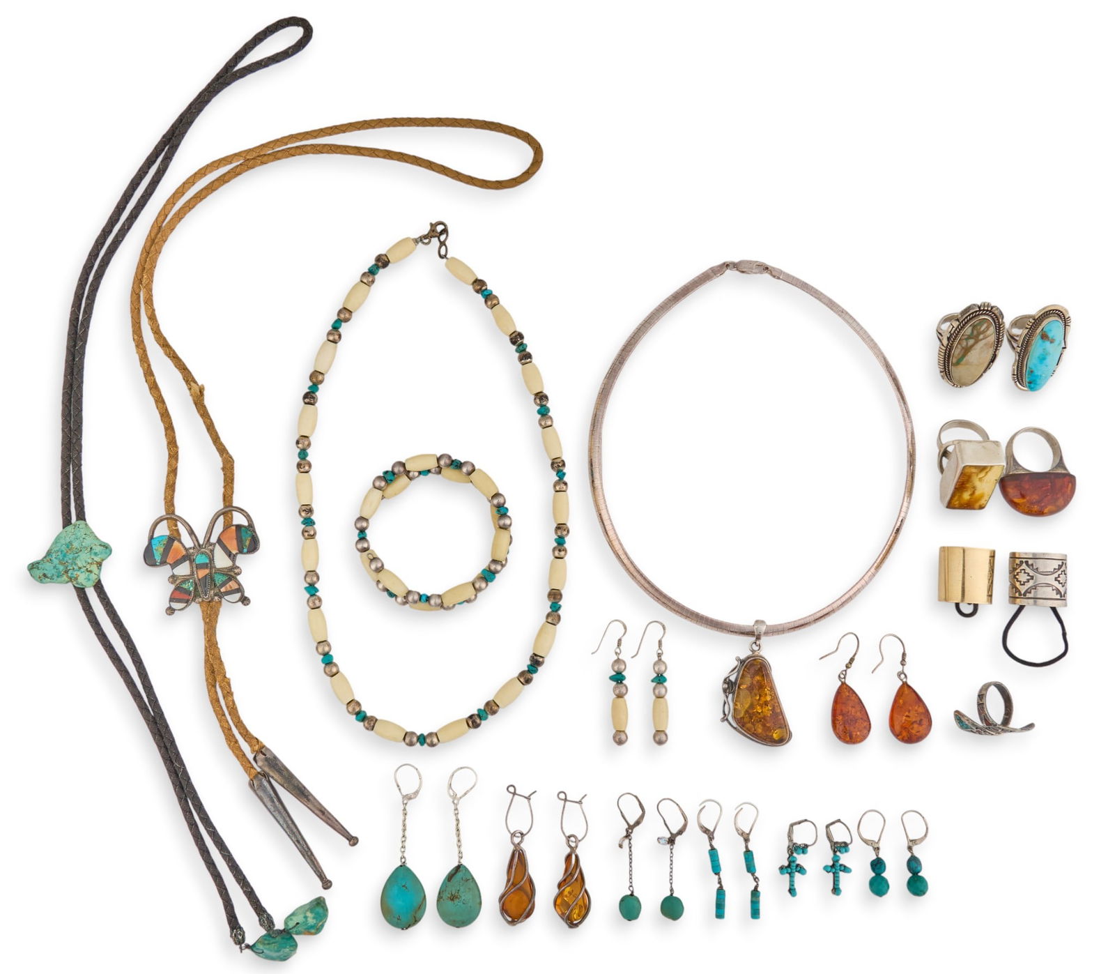 Mixed Collection of Southwestern Accessories: Mixed collection of Southwestern accessories to include two bolo ties, two necklaces, one bracelet, eight pairs of earrings, and seven rings, each featuring various stones and styles Total weight: 7.5