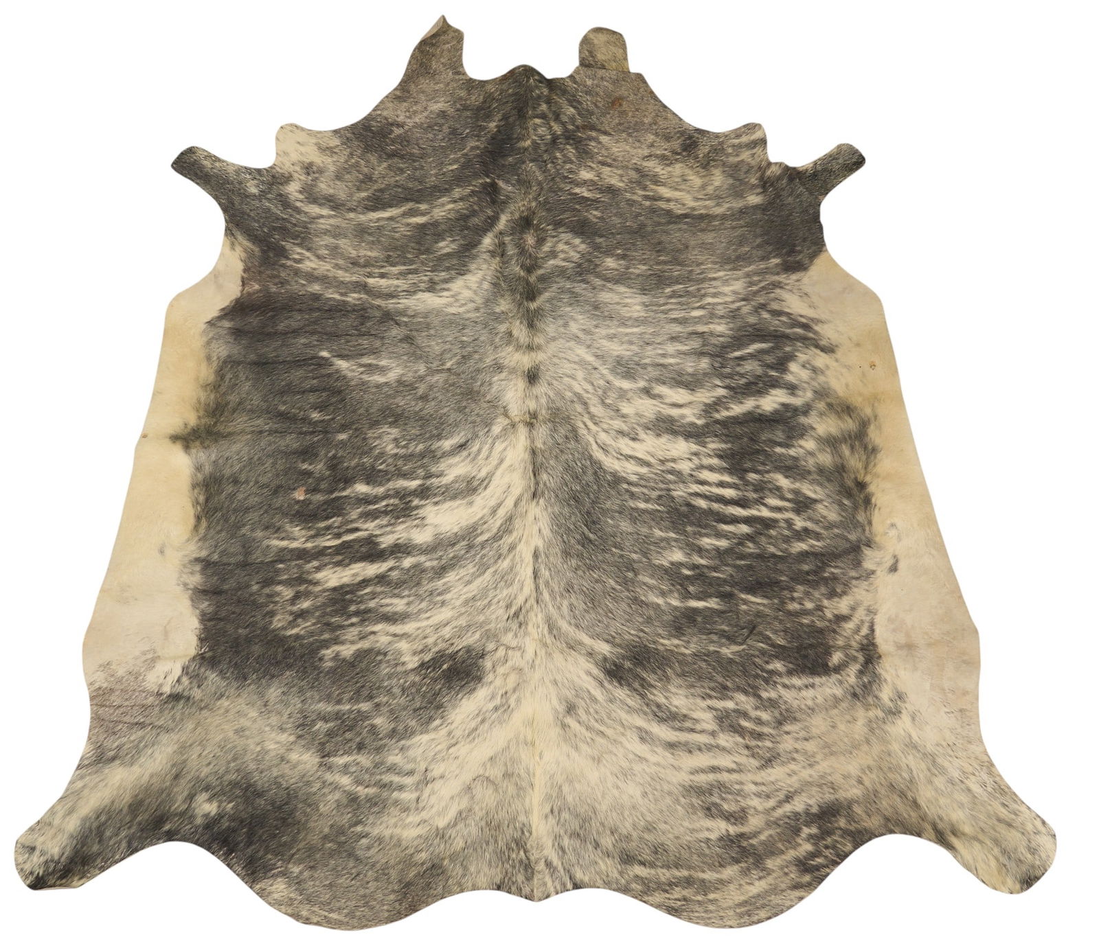 Speckled Cowhide Rug: Black and white speckled cowhide rug7 ft. 11 in. x 7 ft. Provenance: Property from a home in San Antonio, Texas 