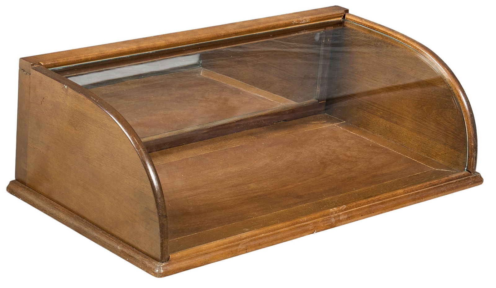 Vtinage Glass Showcase: Vintage glass showcase with mirrored back panel, and curved top height 9.5 in. x width 31 in. x depth 16 in. Provenance: Property from a home in San Antonio, Texas