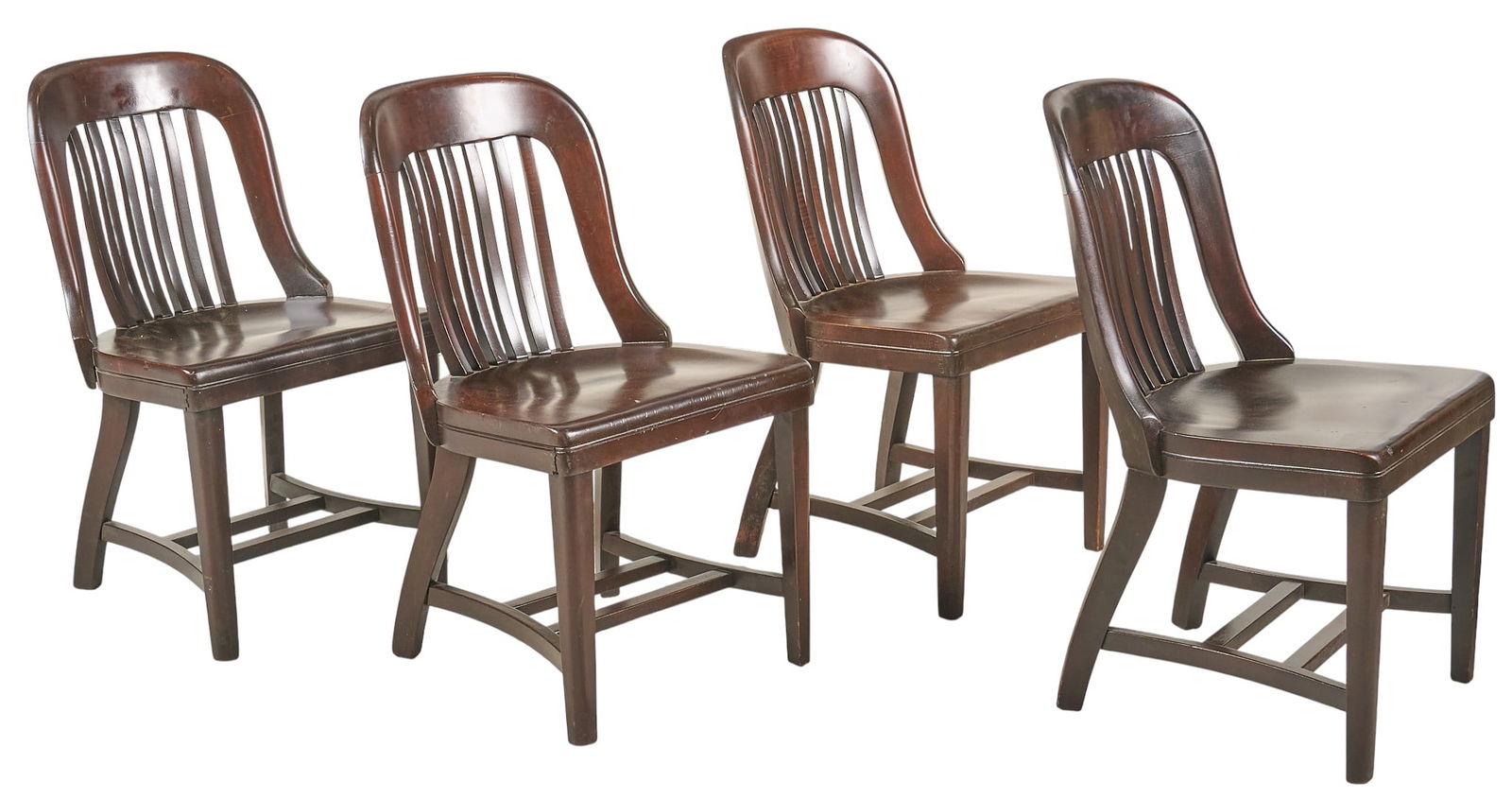 (4) Vintage Spindle Back Chairs: Set of four vintage wooden chairs with spindle backs, and a dark finishheight 32 in. x width 18 in. x depth 21 in. / eachProvenance: Property from a home in San Antonio, Texas 
