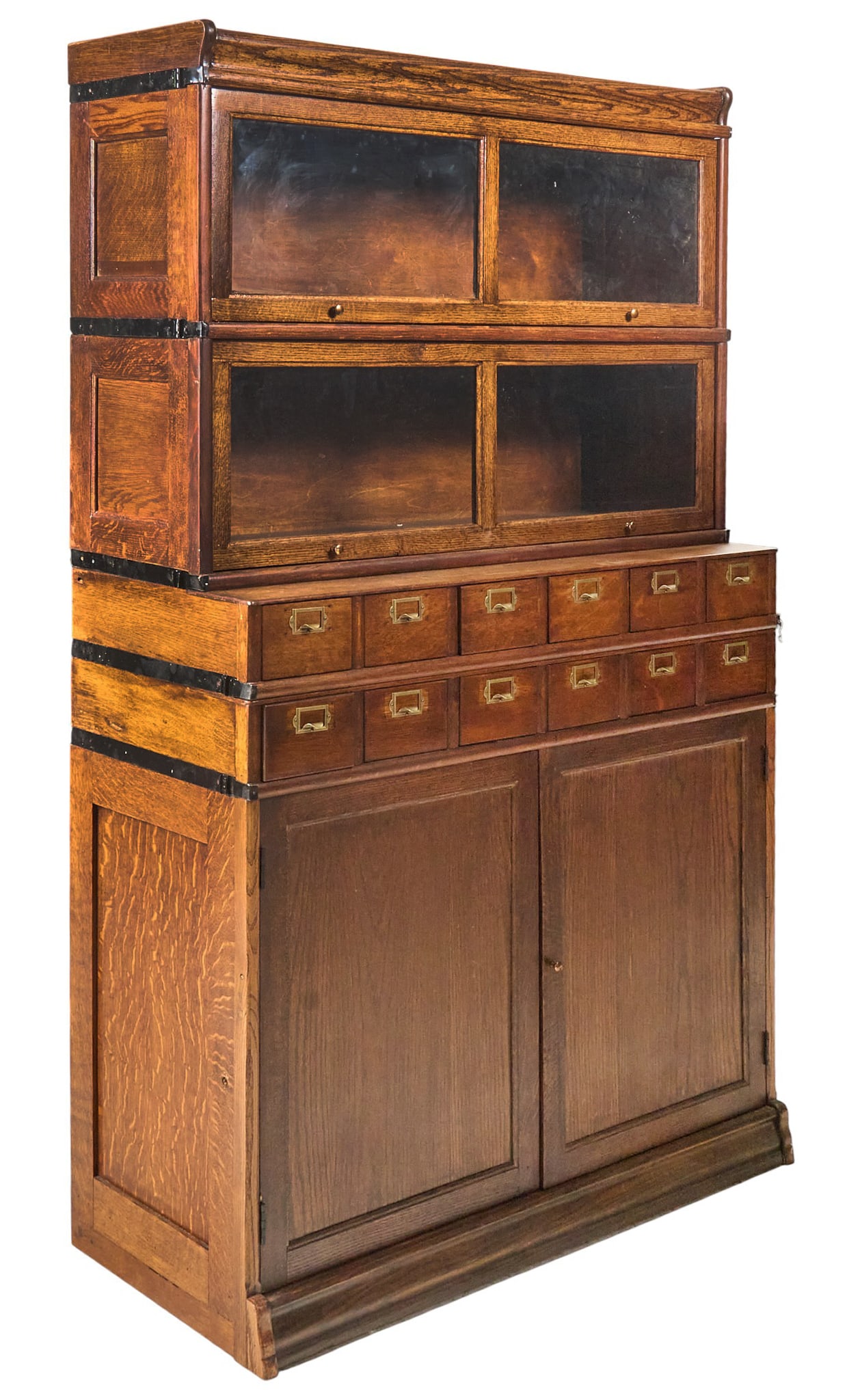 Vintage Rustic Bookcase: Vintage rustic bookcase with two glass-front cabinets, twelve drawers, and bottom pair of paneled doors opening to storageheight 69 in. x width 41.5 in. x depth 18 in. Provenance: Property from