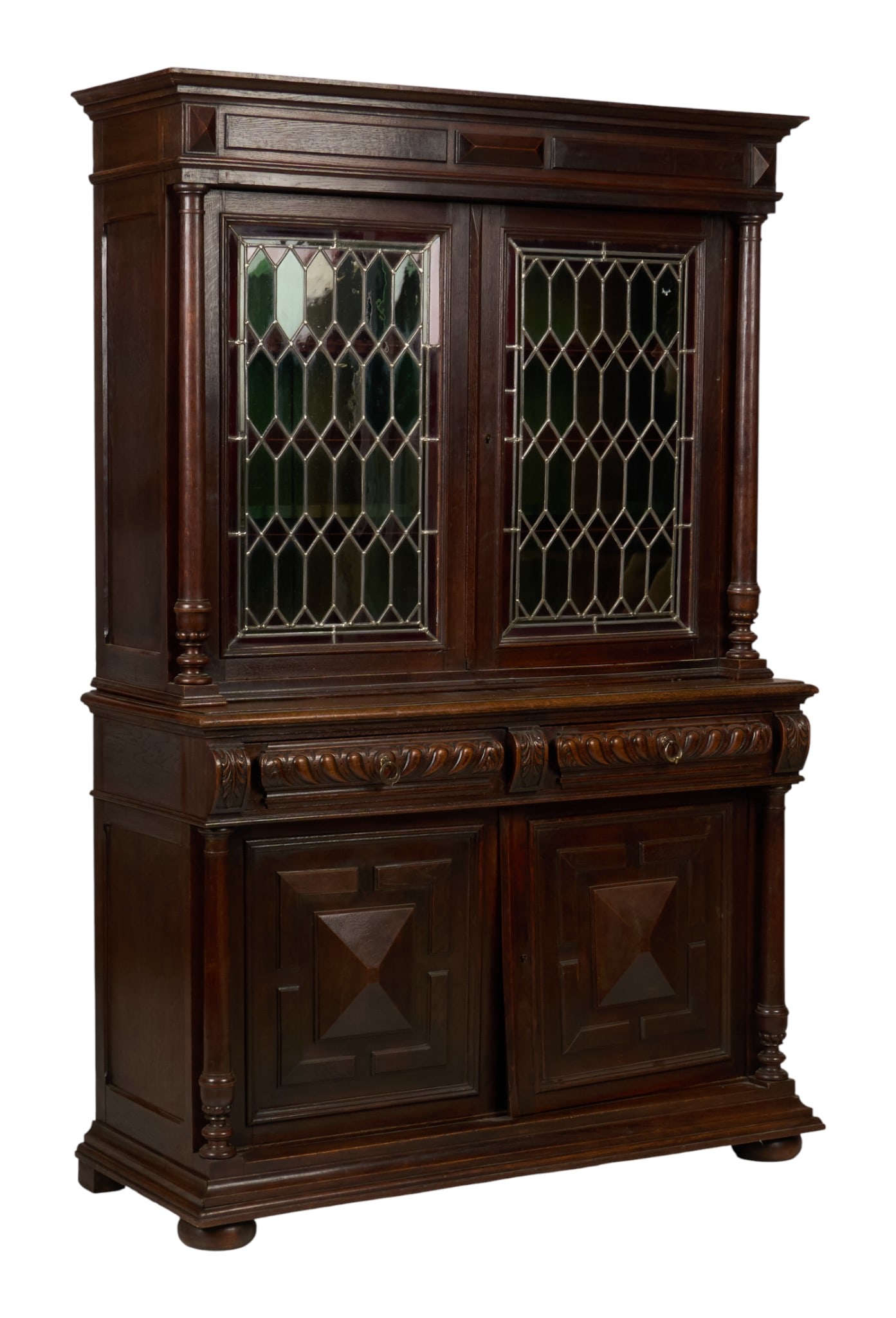 Leaded Glass Door Cabinet: Antique cabinet with leaded glass doors on the upper section above two drawers, and bottom cabinet height 81 in. x width 54 in. x depth 21 in. Provenance: Property from a home in San