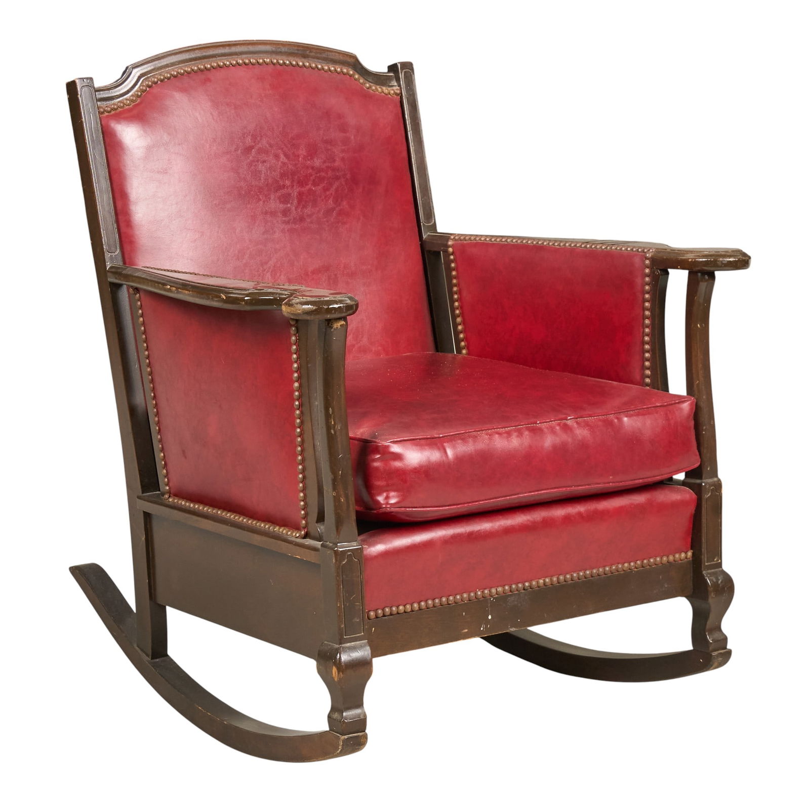 Vintage Leather Rocking Chair: Vintage rocking chair with red leather upholstery and metal rivet trimheight 36 in. x width 29 in. x depth 33 in. Provenance: Property from a home in Goldwaithe, Texas 