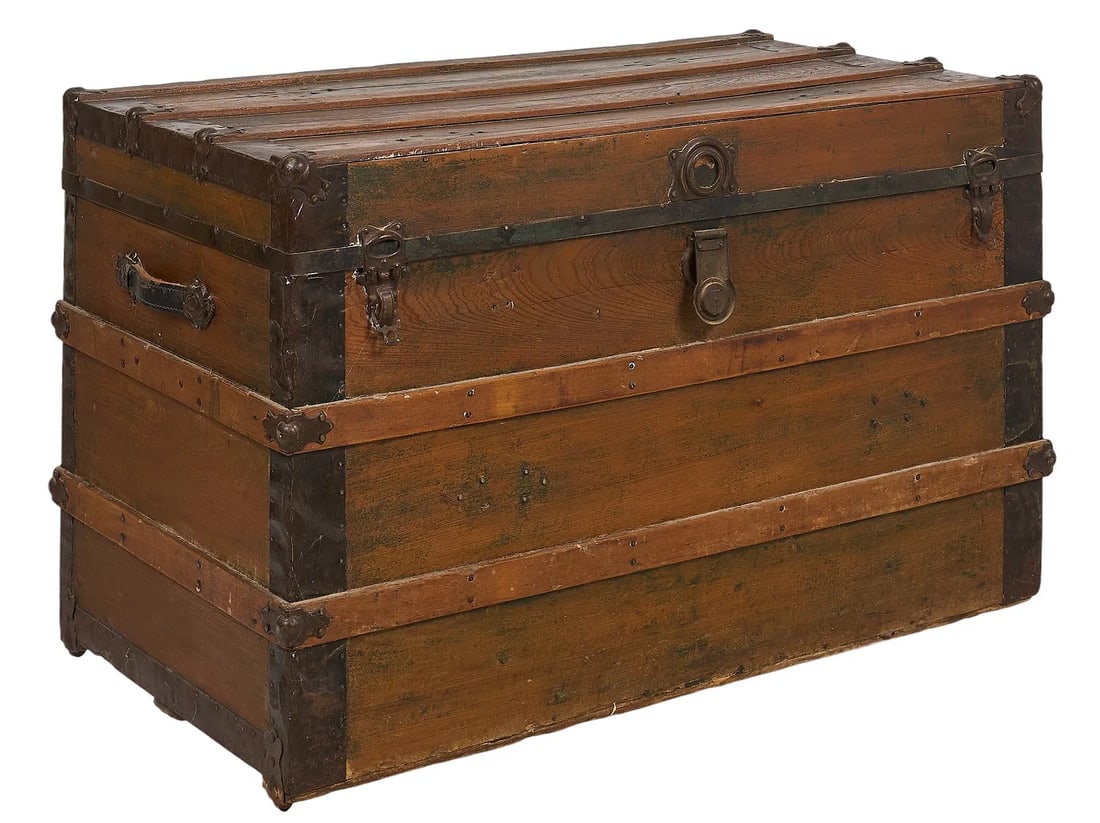 Antique Wood and Metal Banded Trunk: Antique rustic wooden trunk metal bandingheight 25 in. x width 42.5 in. x depth 22.5 in. Provenance: Property from a home in San Antonio, Texas