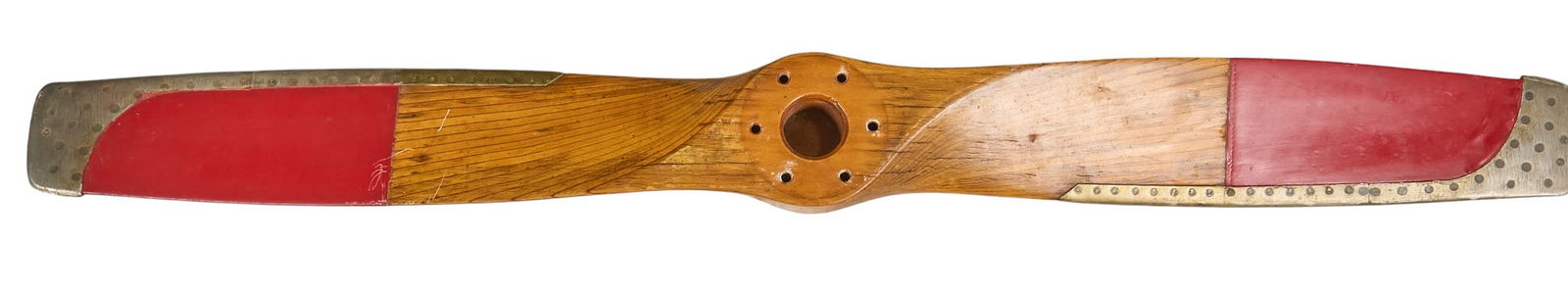 Vintage Decorative Wooden Airplane Propeller: Vintage wooden decorative airplane propeller, with red painted tips and metal leading edgesheight 60 in. x width 4 in. x depth 6 in. Provenance: Property from a home in Seguin, Texas