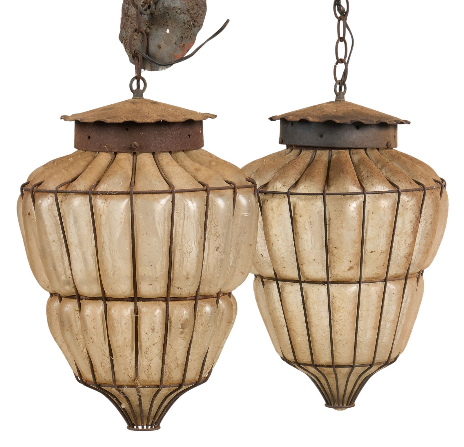 Pair of Vintage Hanging Glass Lanterns: Pair of vintage hanging lanterns with ribbed blown glass shade and metal frame height 18 in. width 14 in. x depth 14 in. / each Provenance: Property from a home in San Antonio, Texas 