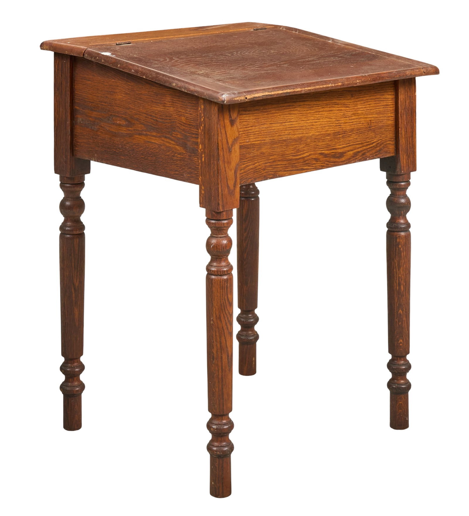 Slant Top Desk: Antique slant top desk with hinged writing surface, supported on turned legs height 35 in. x width 25 in. x depth 23 in. Provenance: Property from a home in San Antonio, Texas 