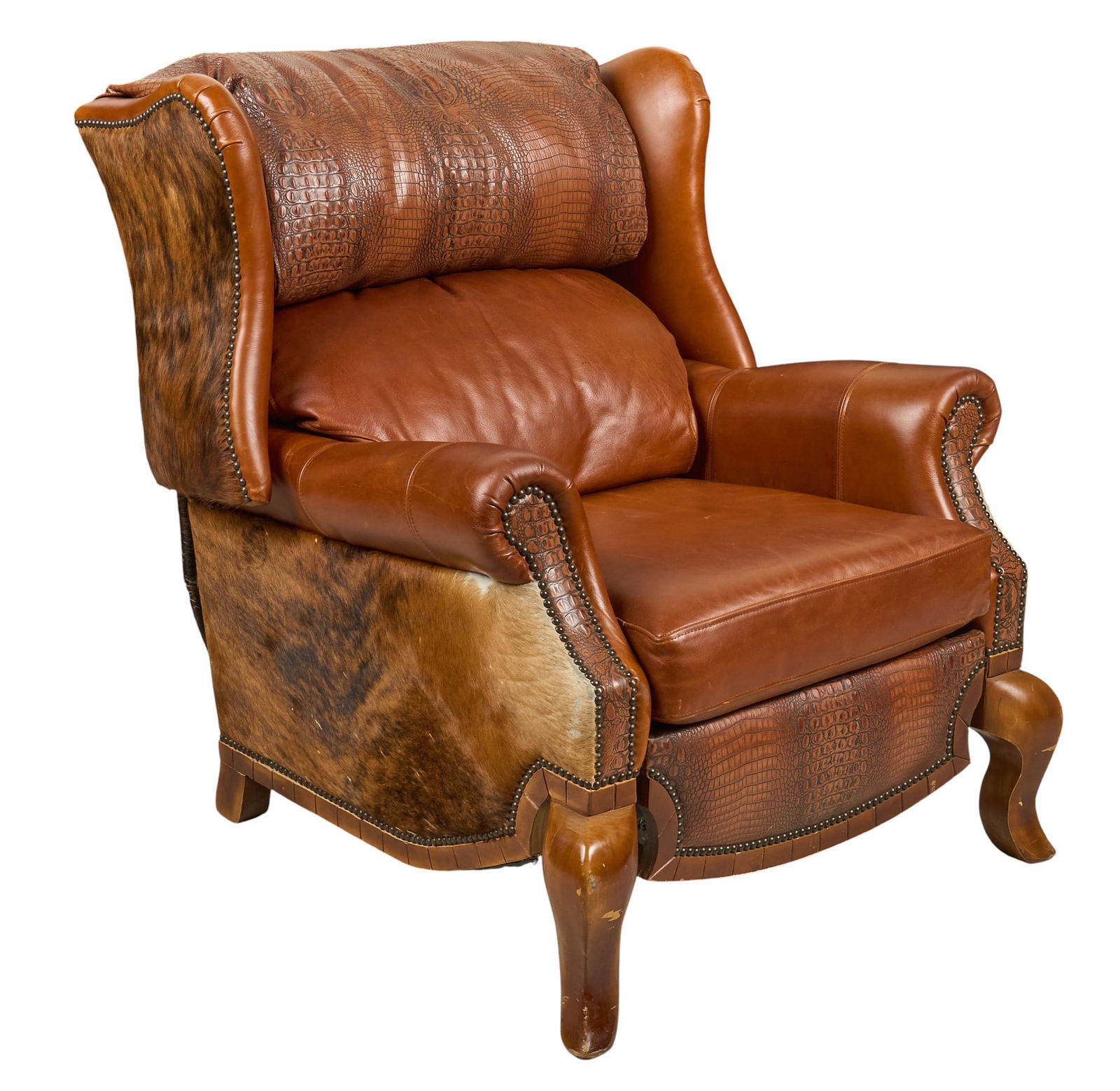 Ranch Style Leather Armchair: Ranch style armchair with orange leather, crocodile leather, and hair on hide upholstery, supported on chunky cabriole legs height 40 in. x width 46 in. x depth 39 in. Provenance: Property from