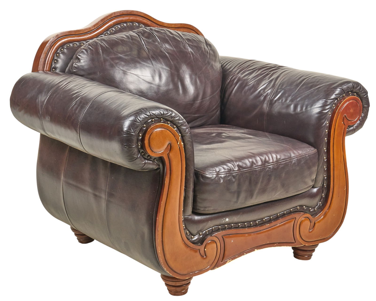 Vintage Leather Chair: Vintage armchair with brown leather upholstery, and scrolled armrests height 37 in. x width 44 in. x width 38 in. Provenance: Property from a home in Comfort, Texas