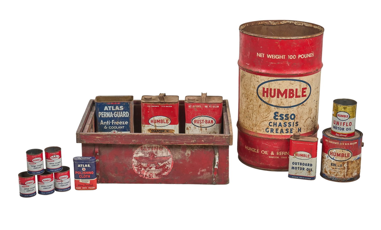 Collection of Vintage Humble Oil Items: Collection of vintage Humble Oil containers, with one large barrel and various cans, circa mid-20th century height 23.5 in. x width 14 in. x depth 14 in. / largestProvenance: Property from a