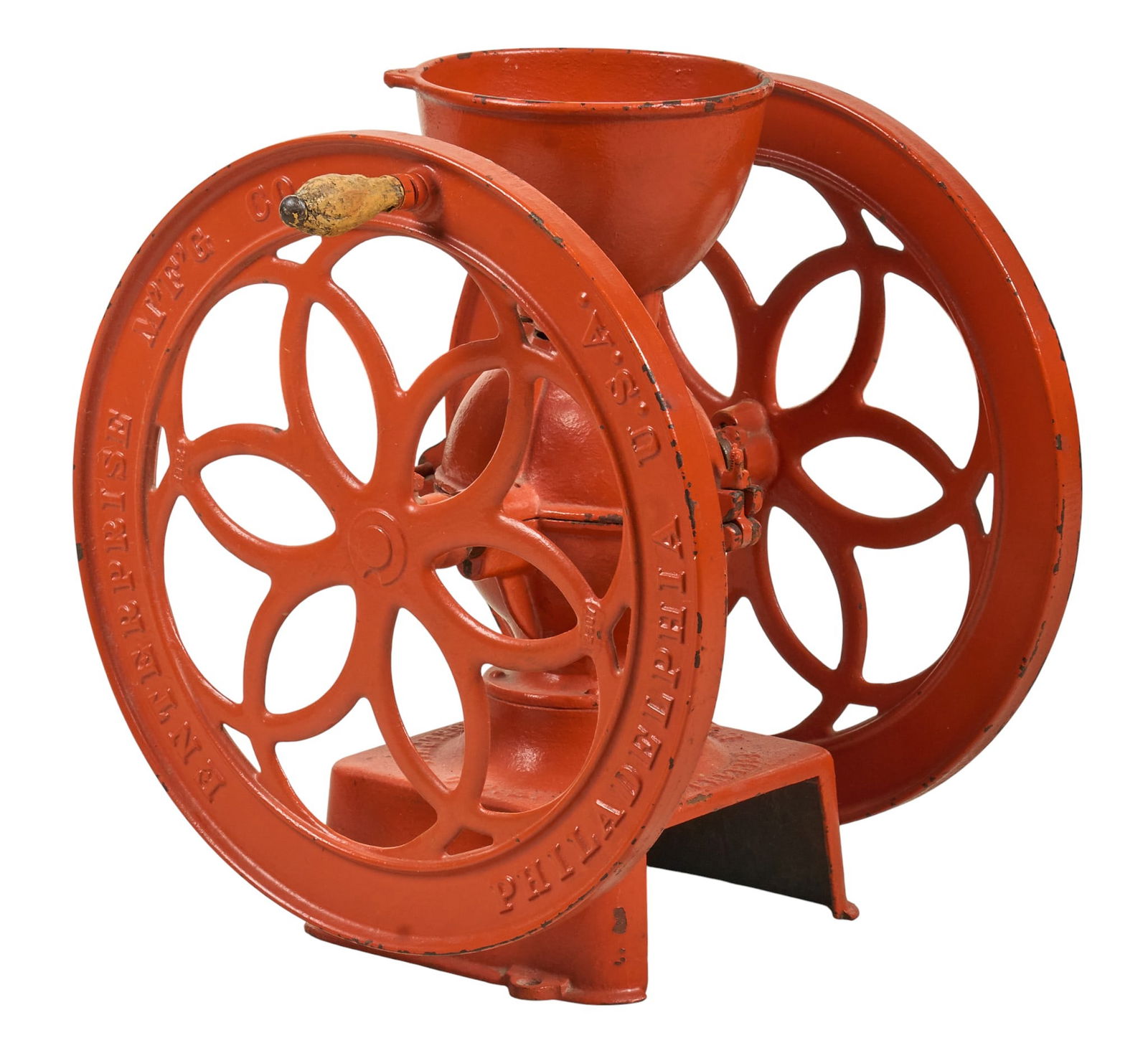 Vintage Painted Coffee Grinder: Vintage Enterprise Manufacturing Co. coffee grinder, painted red with wooden handle height 19 in. x width 22 in. x depth 17 in. Provenance: Property from a home in San Antonio, Texas