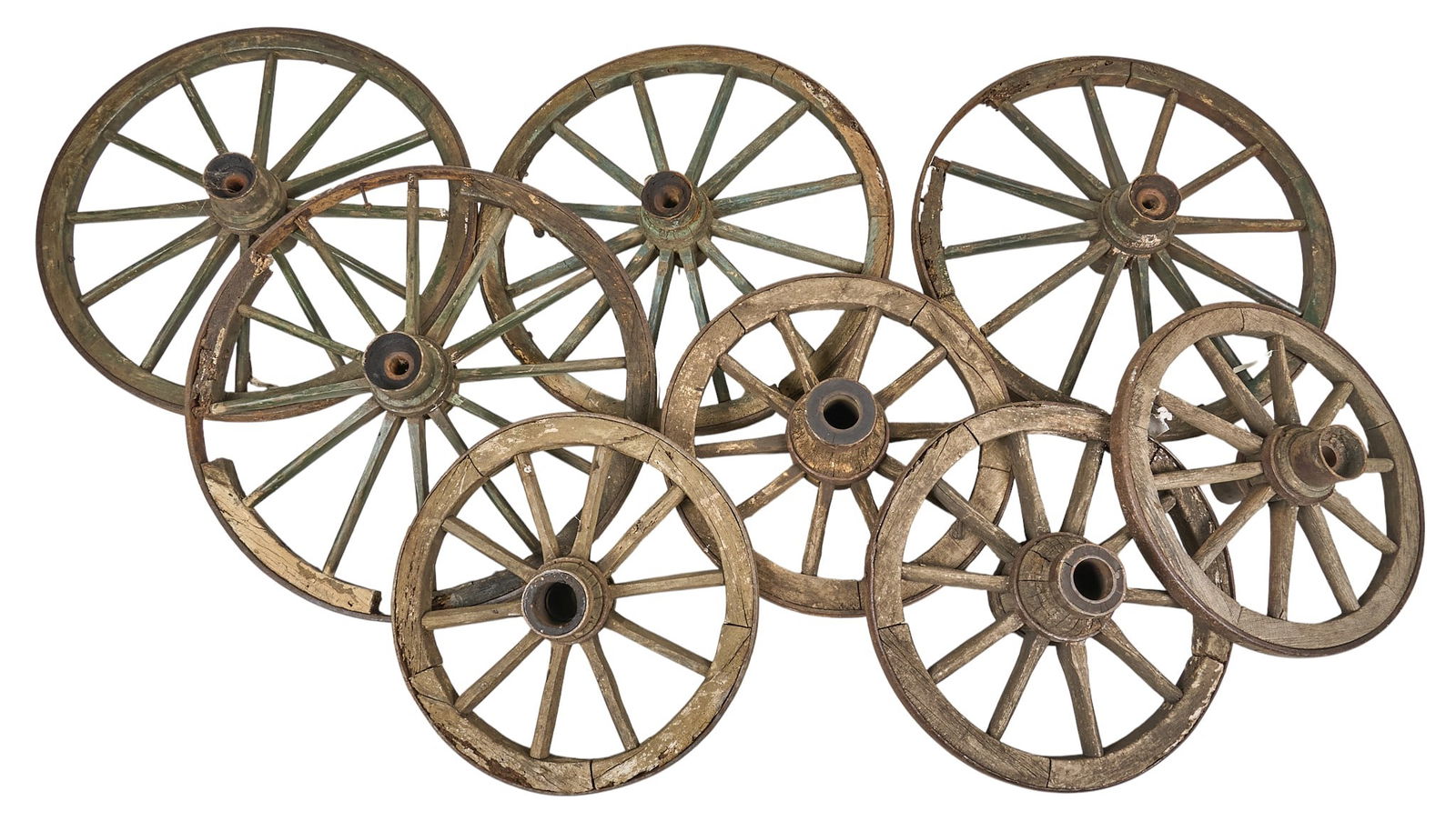 (8) Wagon Wheels: Collection of eight rustic wagon wheels diameter 42 in. / x depth 14 in. / largest Provenance: Property from a home in Boerne, Texas