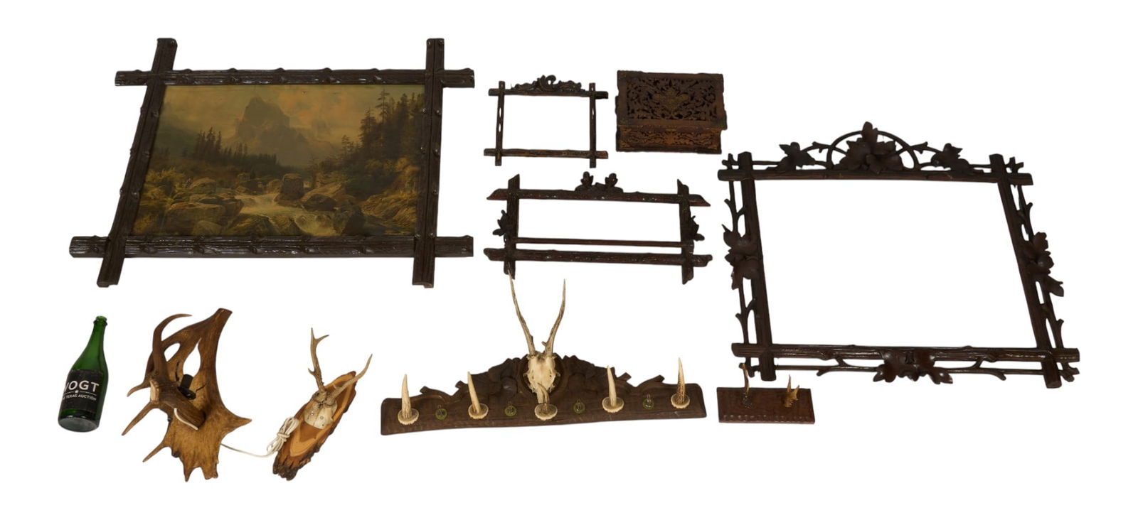 (11) Black Forest Style Items: Eleven Black Forest style decorative items., with picture frames, a painting, a coat rack with antlers, and other carved wood items 