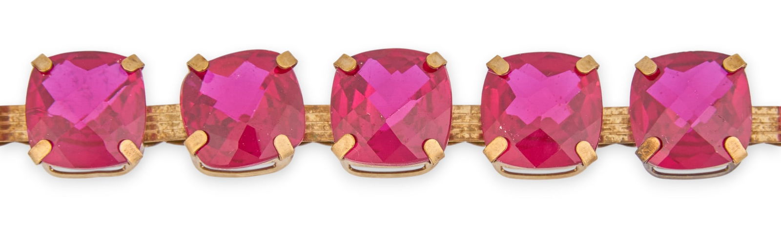 10K Gold & Ruby Bracelet: 10K yellow gold bracelet with inlaid rubies, clasp marked "10K"Length: 7 in. Total weight: 12.4 gProvenance: Property from a home in San Antonio, Texas