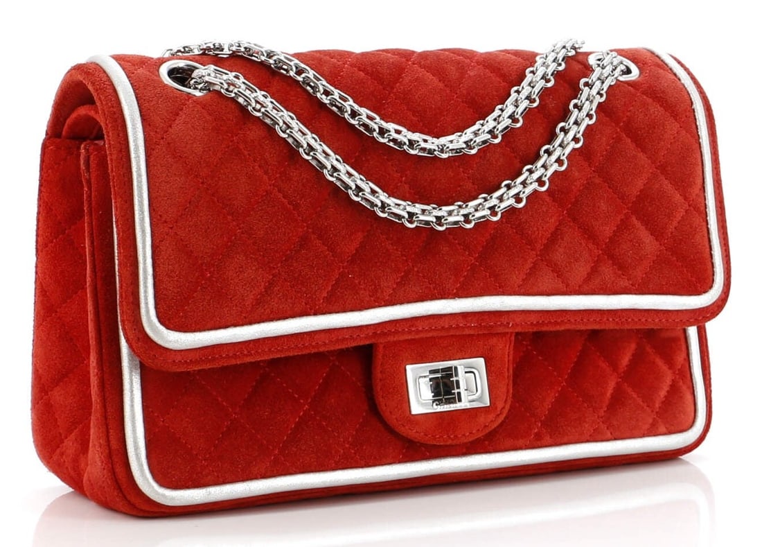 Chanel Reissue 2.55 Flap 225 Shoulder Bag: Chanel Reissue 2.55 Flap shoulder bag in red and silver suede quilted leather with reissue chain, and silver hardware, marked 22409016; third-party authenticated9.5 in. x 6 in. x 3 in.Condition