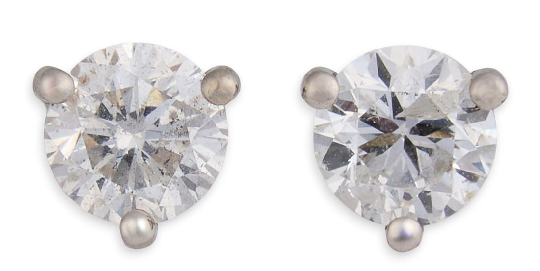 14K Diamond Stud Earrings: 14K white gold diamond stud earrings, each earring with prong set round diamond in a martini setting (approx 1.01 ctw)Total weight: 0.8 gProvenance: Property from a home in San Antonio, Texas