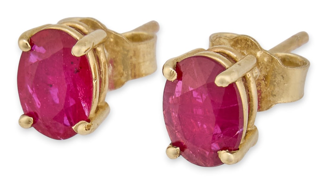 14K Ruby Earrings: Pair of 14K yellow gold earrings with natural oval-shaped brilliant cut rubies, 1.8 ctw, marked "14KTotal weight: 1.1 gProvenance: Property from a home in San Antonio, Texas