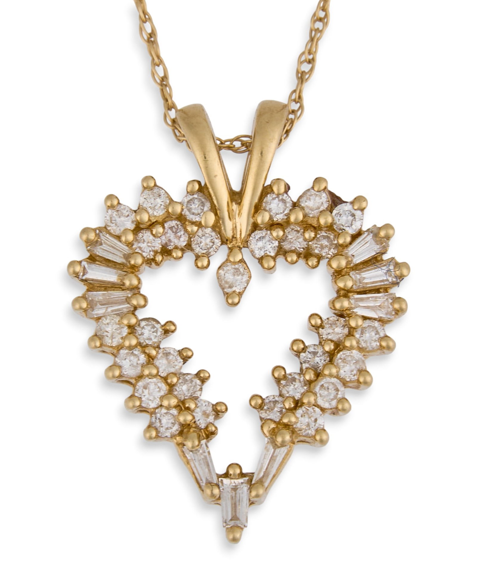 14K Diamond Heart Pendant with 10K Chain: 14K diamond heart pendant with 10K yellow gold chain, pendant marked "keepsake" and "14k, with chain marked "10k" on claspLength 17 in.Total weight: 8.23 gProvenance: