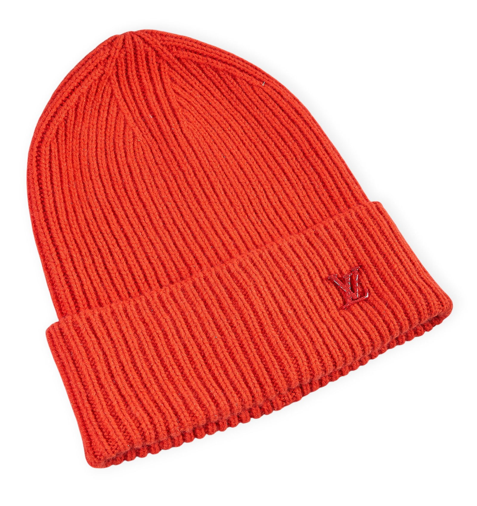 Louis Vuitton Spark Beanie: Louis Vuitton Spark beanie, red cashmere with red LV monogram pin9.5 in. x 8.25 in. Provenance: Property from the Dominion home of a prominent San Antonio, Texas beverages