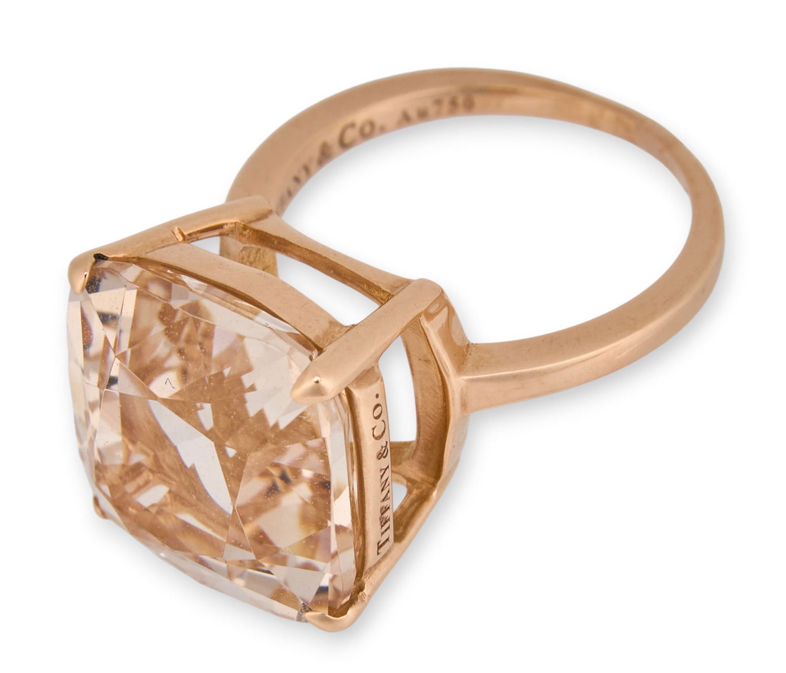 Tiffany & Co. 18K Pink Topaz Ring: Tiffany & Co. 18K rose gold ring, set with a large cushion-cut pink topaz in an open, architectural mount, marked “Tiffany & Co. Au750.”Size: 5 Total weight: 6.7 gProvenance: