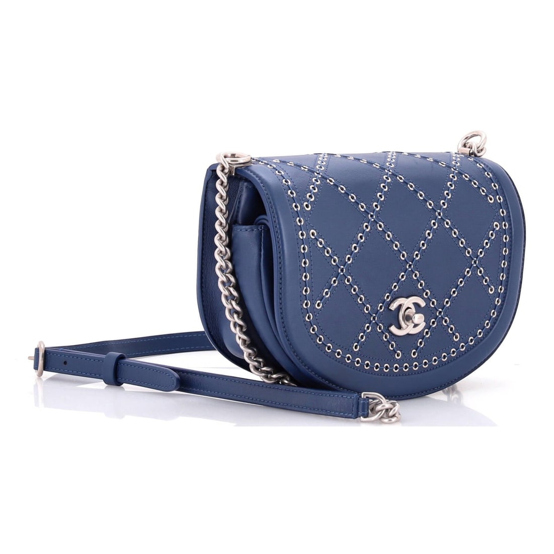 Chanel Coco Eyelets Round Flap Small Shoulder Bag: Chanel Coco Eyelets Round Flap Small shoulder bag in blue calfskin quilted leather, with blue leather strap, and silver hardware, marked 25044972; third-party authenticated 7.5 in. x 5.5 in. x 2 in. C