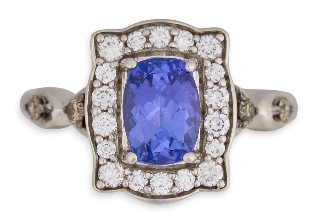 14K Diamond Gemstone Ring: 14K white gold (tested) ring, set with oval cut sapphire center stone, surrounded by a halo of round diamondsSize: 4 Total weight: 3.9 gProvenance: Property from a prominent Kerrville, Texas