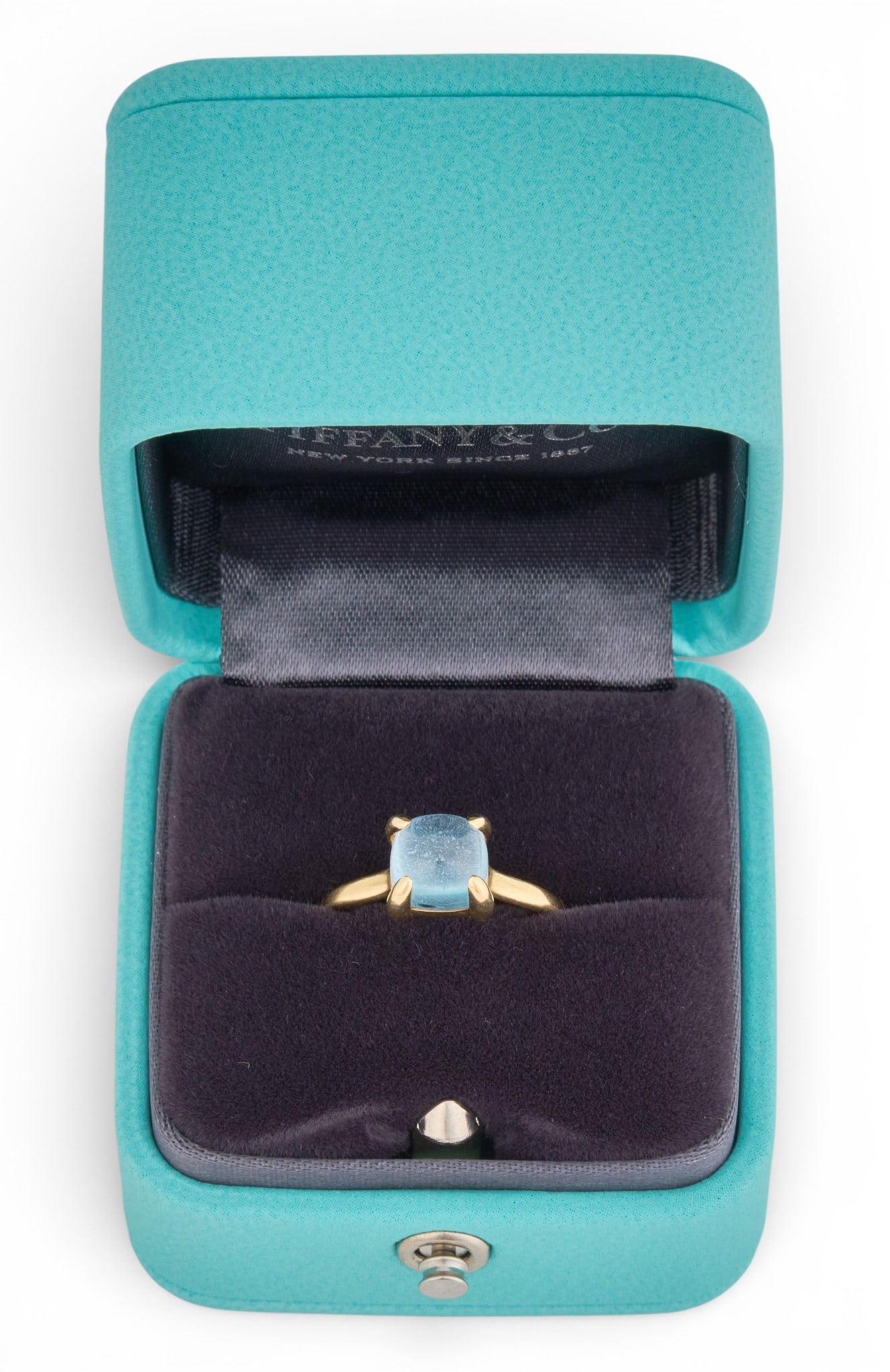 Tiffany & Co. Paloma Picasso 18K Blue Topaz Sugar Stack Ring: Tiffany & Co. Paloma Picasso Sugar Stack ring in 18K yellow gold, set with a cushion shaped blue topaz cabochon, accompanied by original box, marked "Paloma Picasso", "T & Co.&q