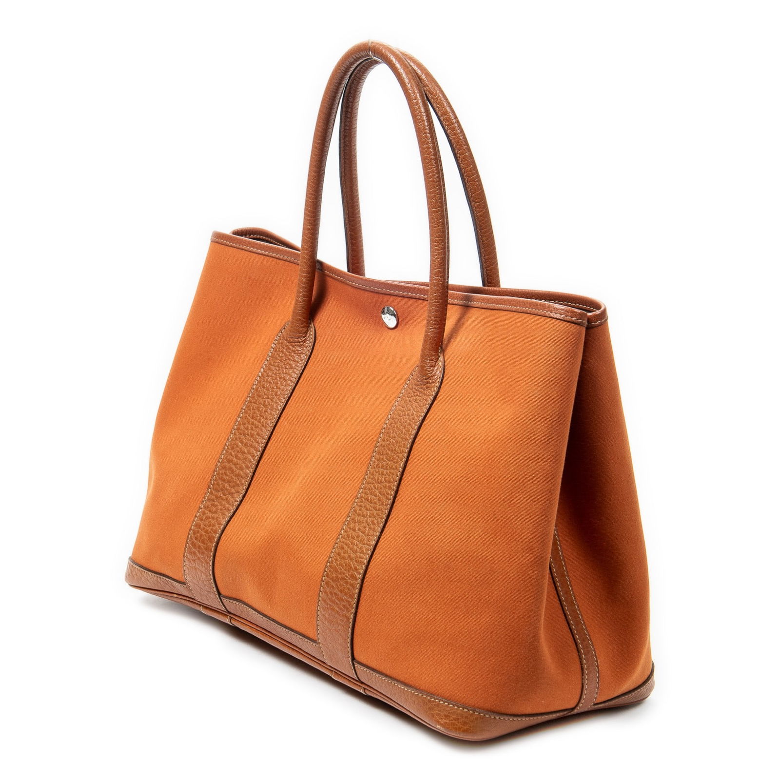 Hermes Garden Party PM Shoulder Bag: Hermes Garden Party PM shoulder bag in orange Toile Officier canvas, with brown leather handles, and palladium hardware, stamped J in square (2006); third-party authenticated14.25 in. x 9.75 in. x